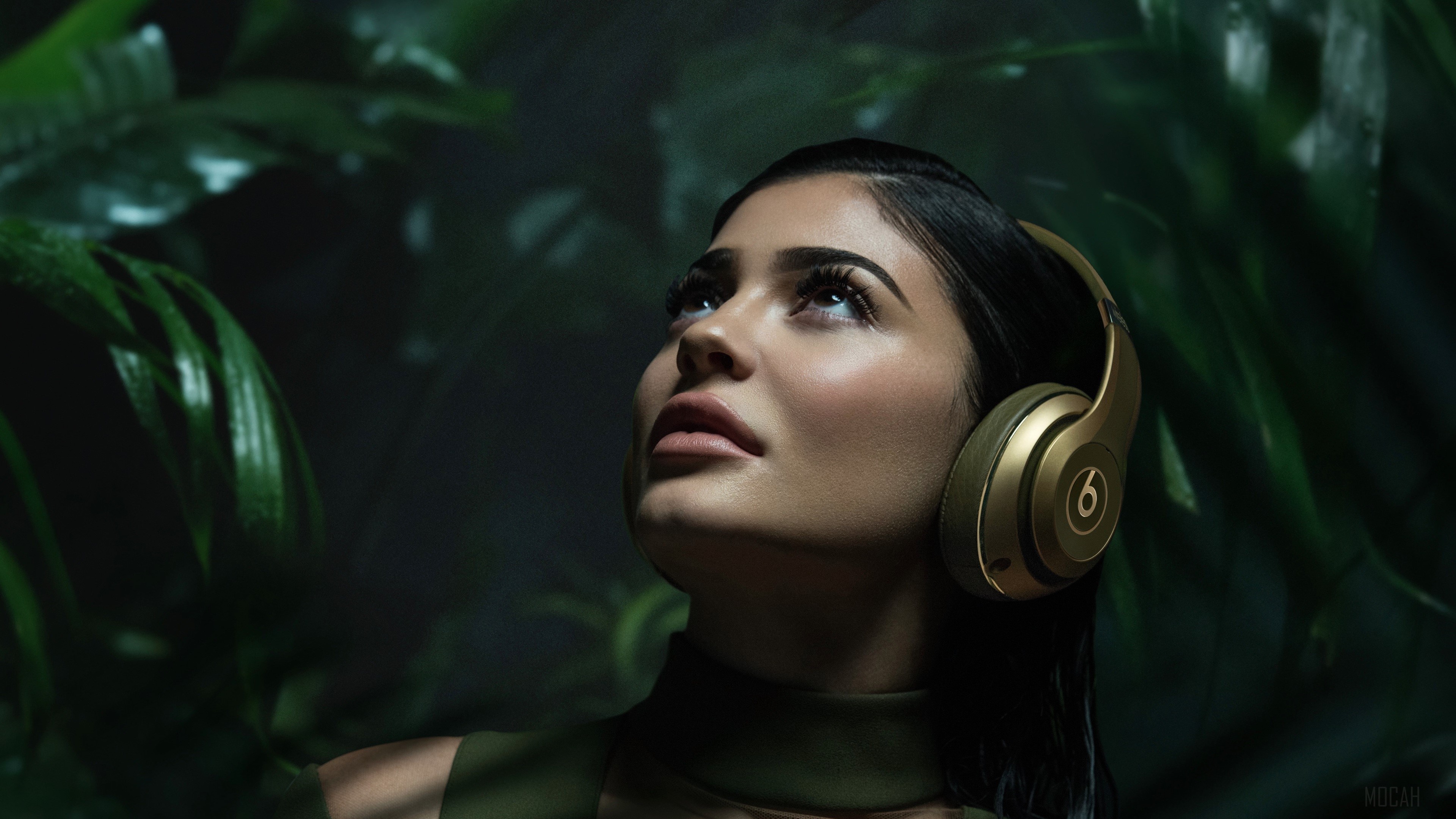 Kylie Jenner wearing Beats headphones in jungle HD Wallpaper