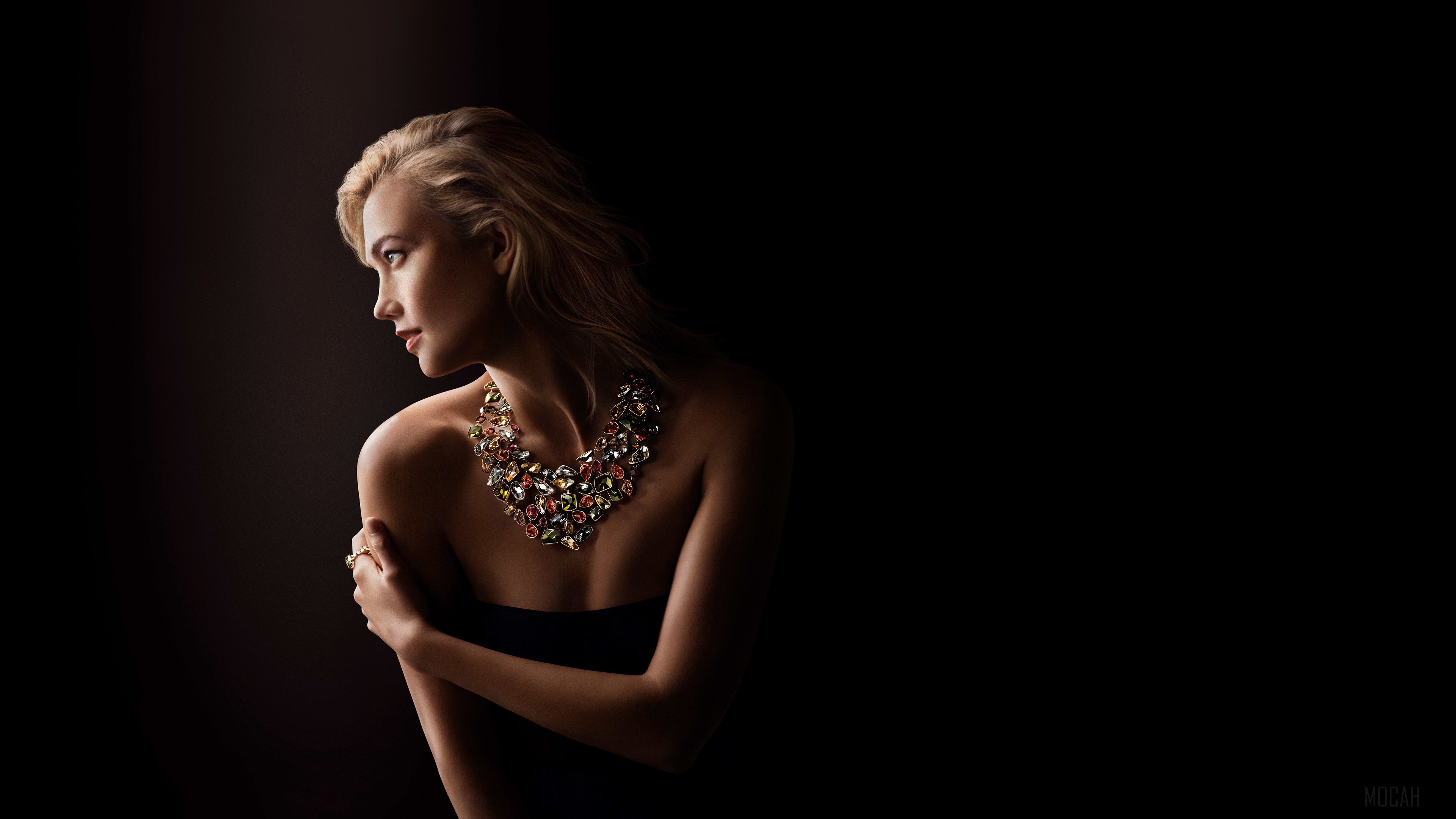 Karlie Kloss wearing a colorful gemstone necklace HD Wallpaper