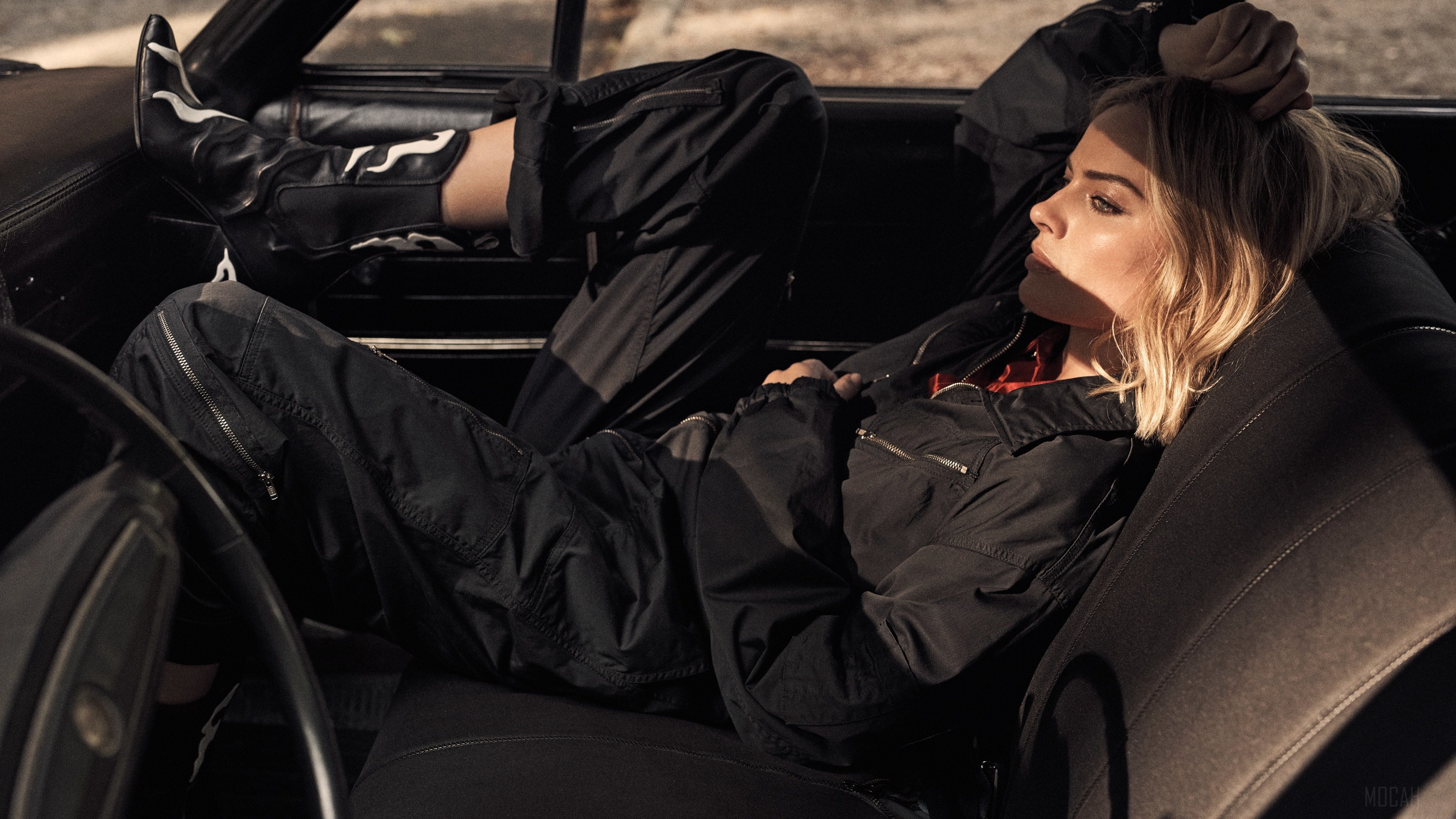 Margot Robbie in a car 4K HD Wallpaper