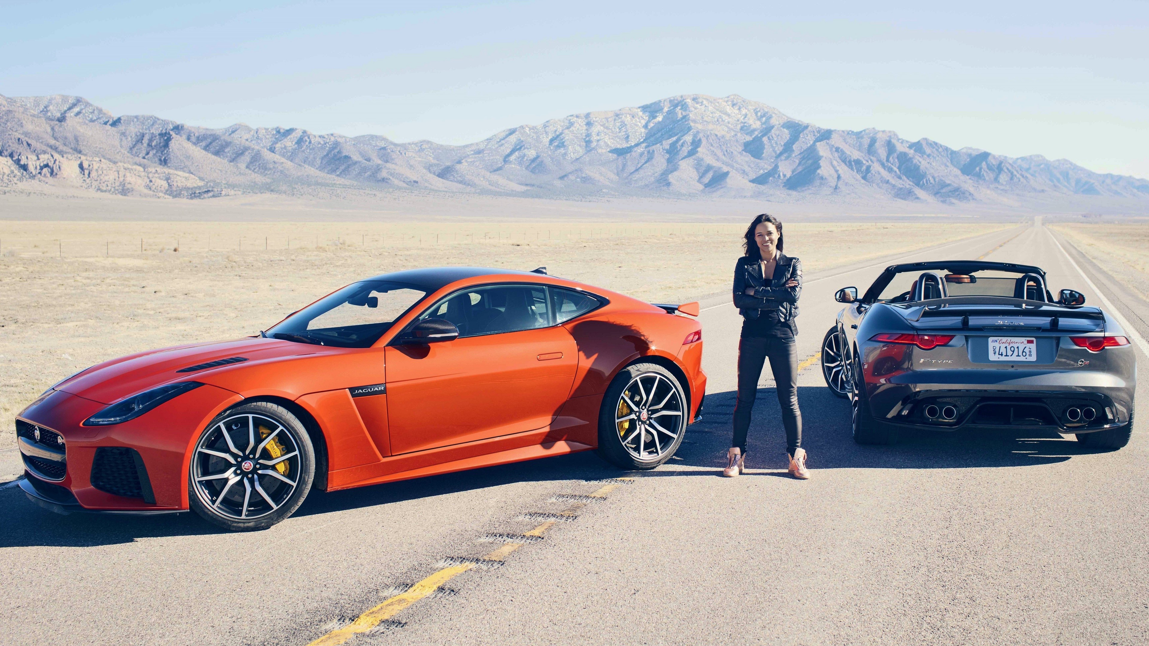 Michelle Rodriguez with Jaguar sports cars HD Wallpaper