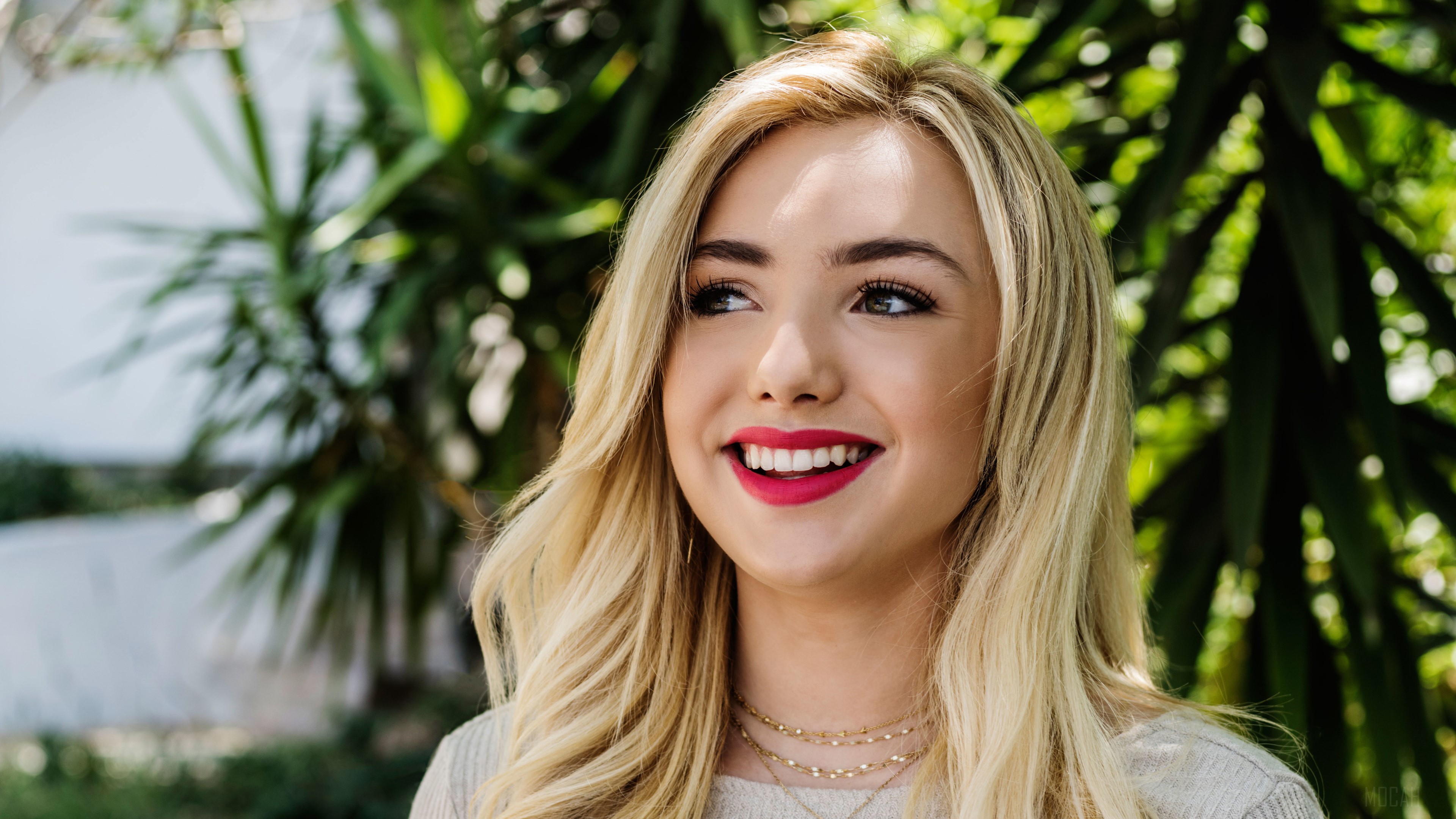 Peyton List smiling with red lipstick 4K HD Wallpaper