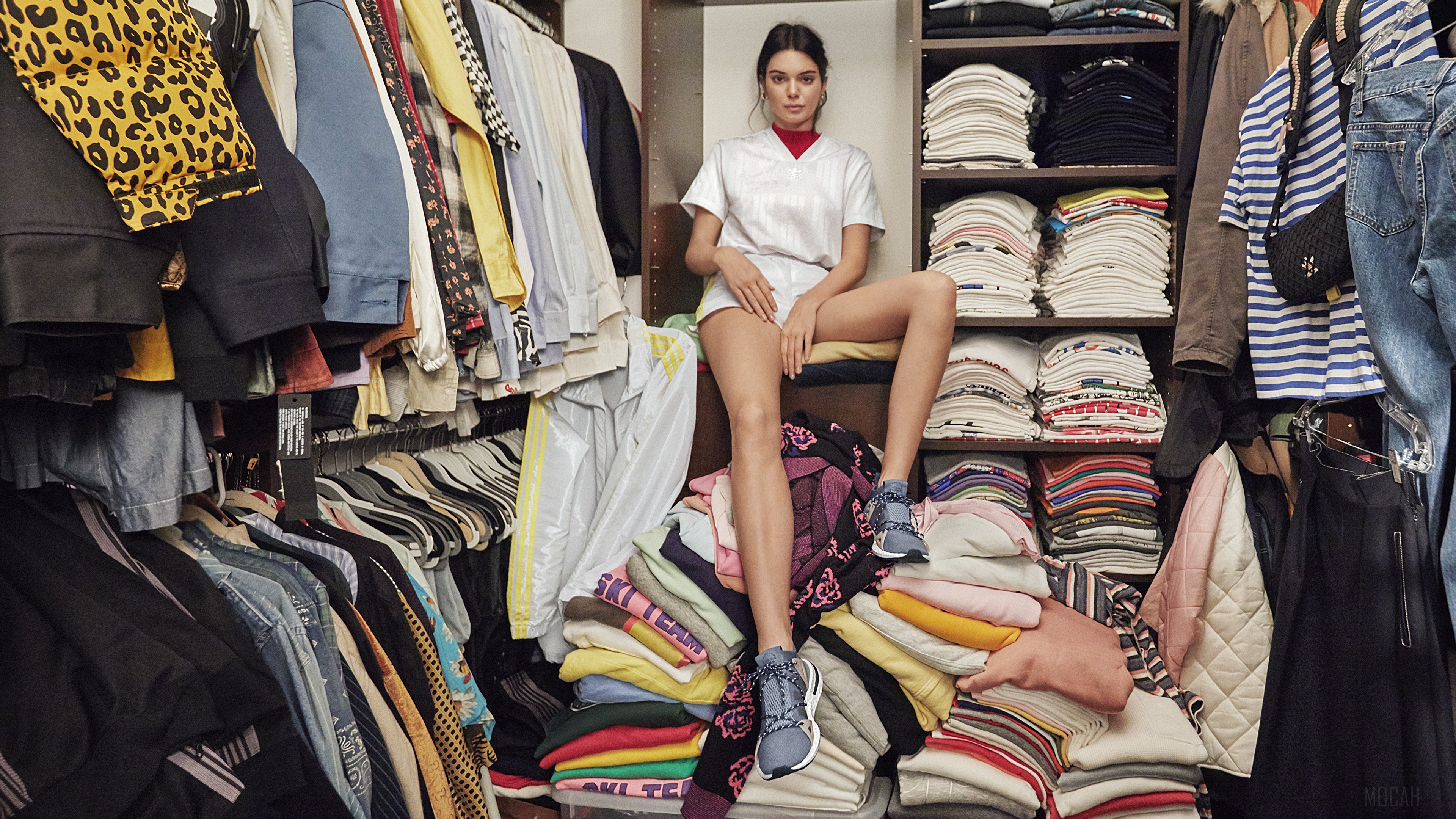 Kendall Jenner in a closet with Adidas shoes HD Wallpaper