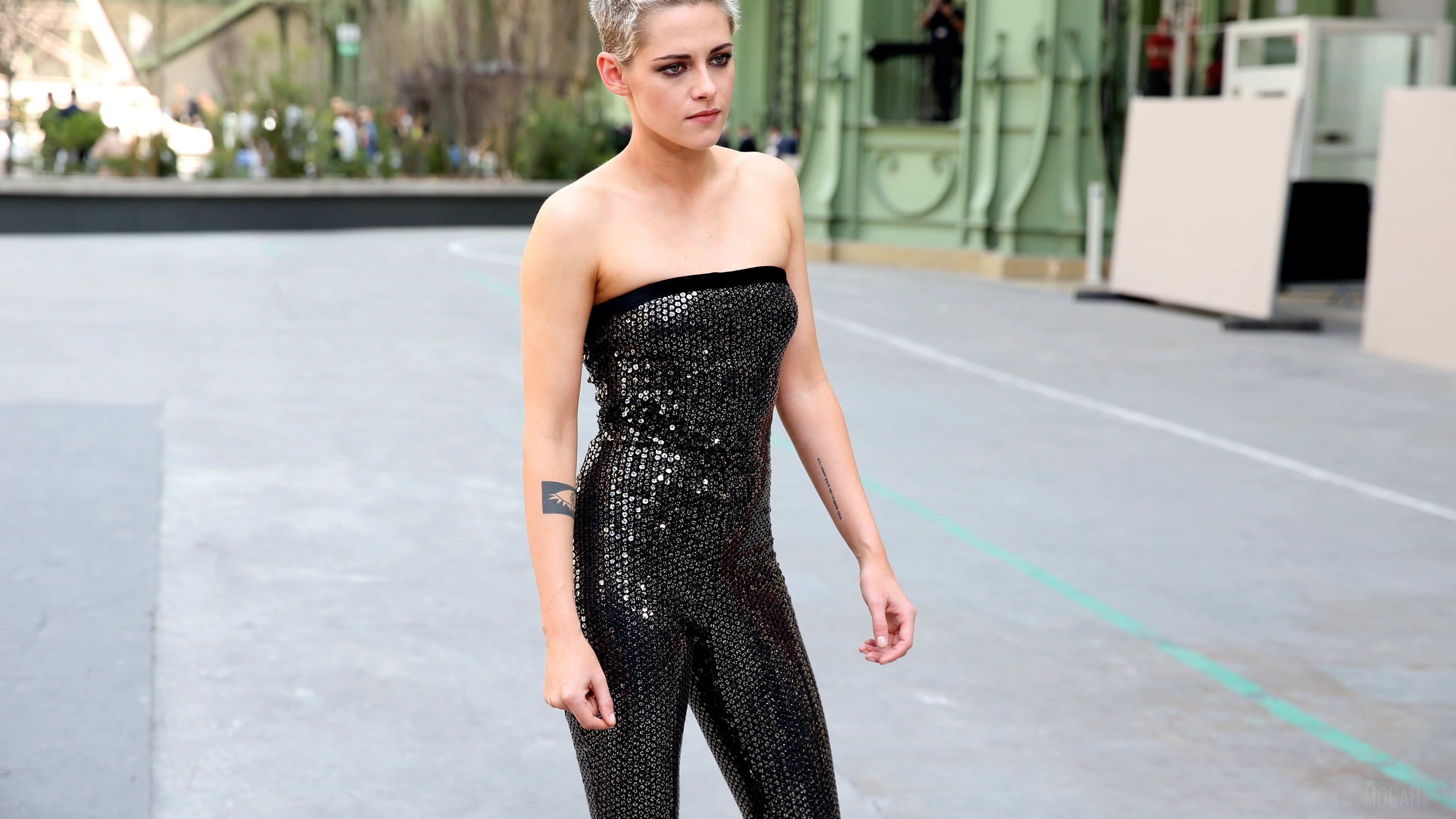 Kristen Stewart in a sequined jumpsuit HD Wallpaper