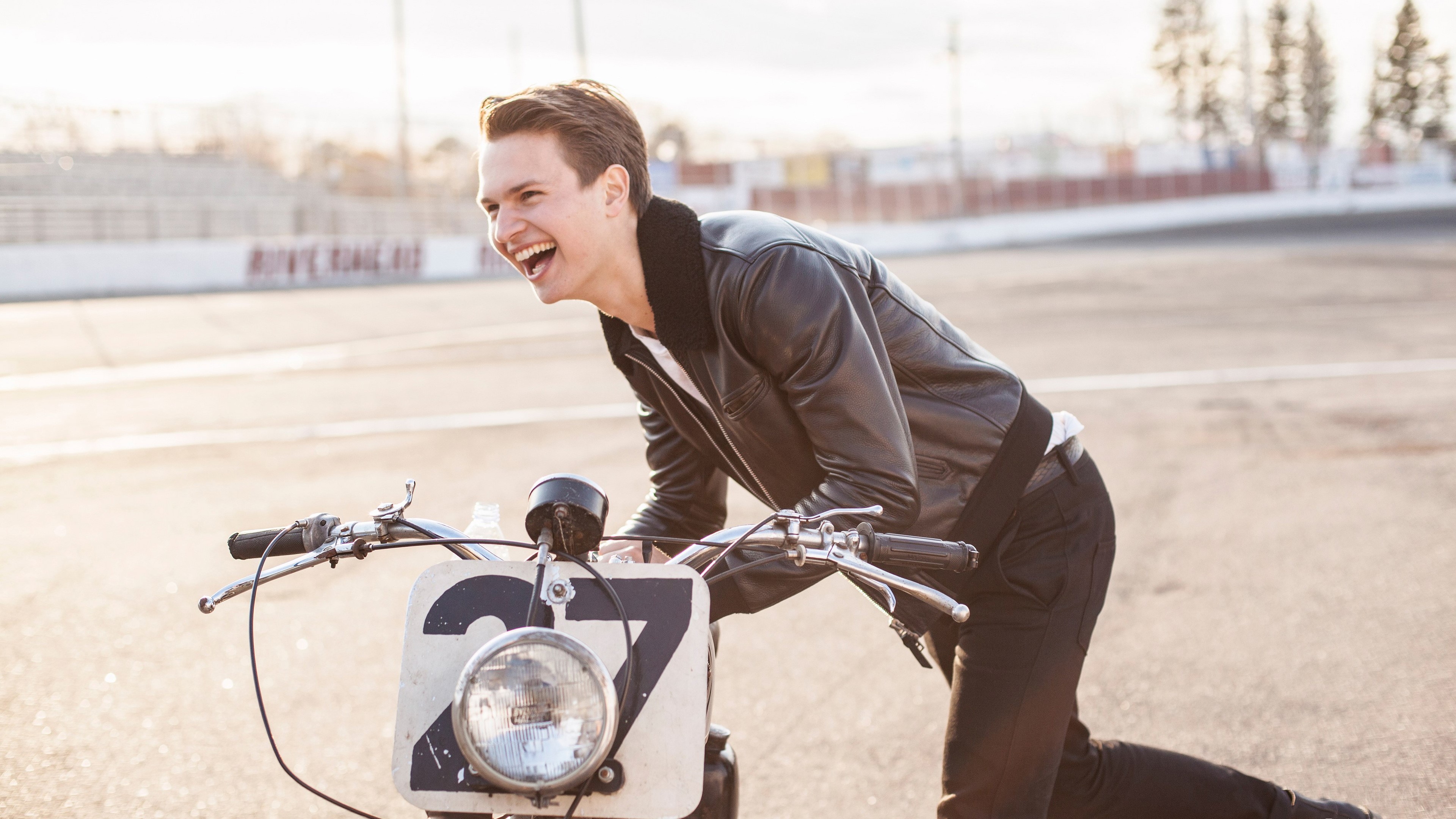 Ansel Elgort on a motorcycle HD Wallpaper
