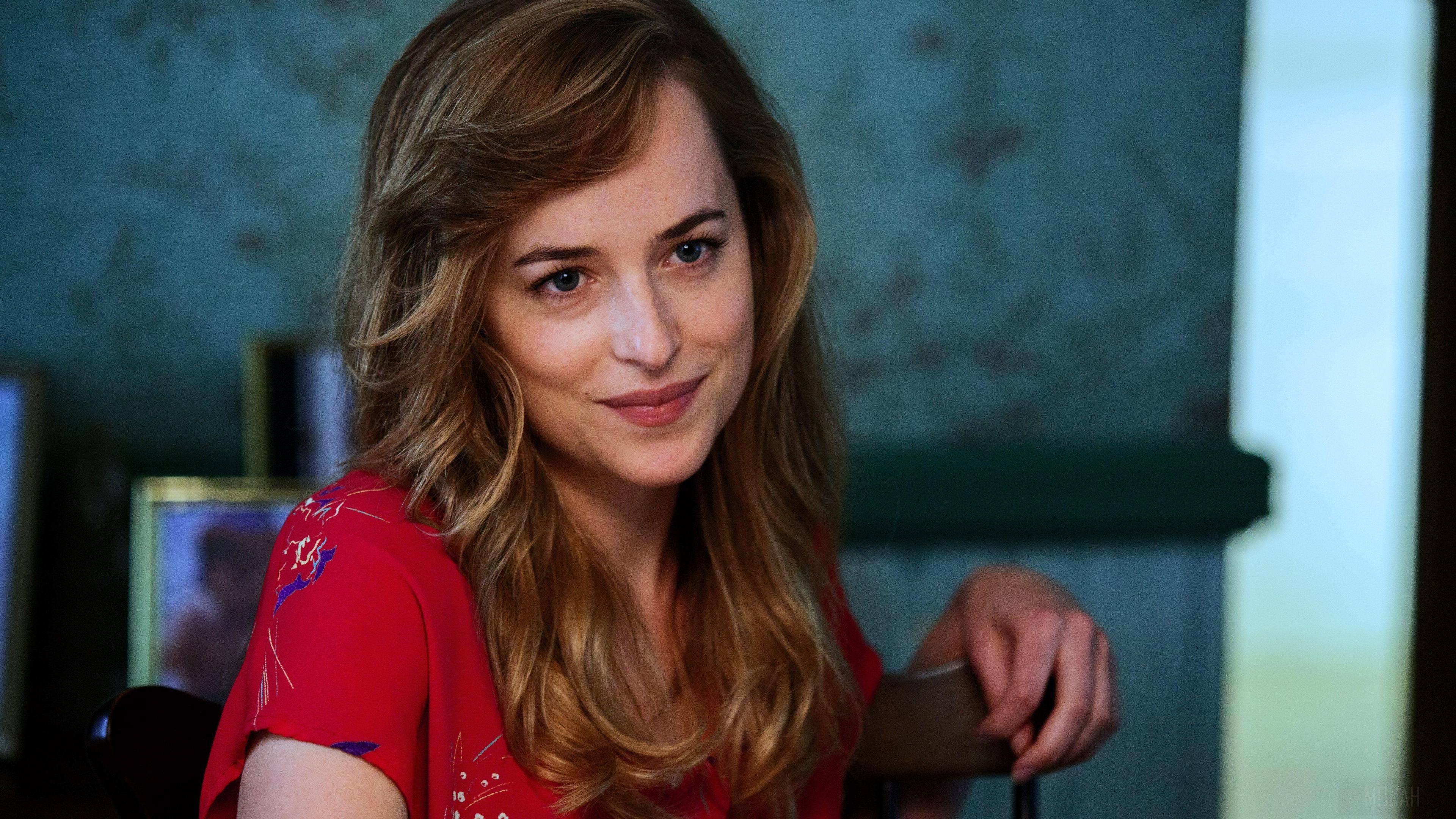 Dakota Johnson in a red dress HD Wallpaper