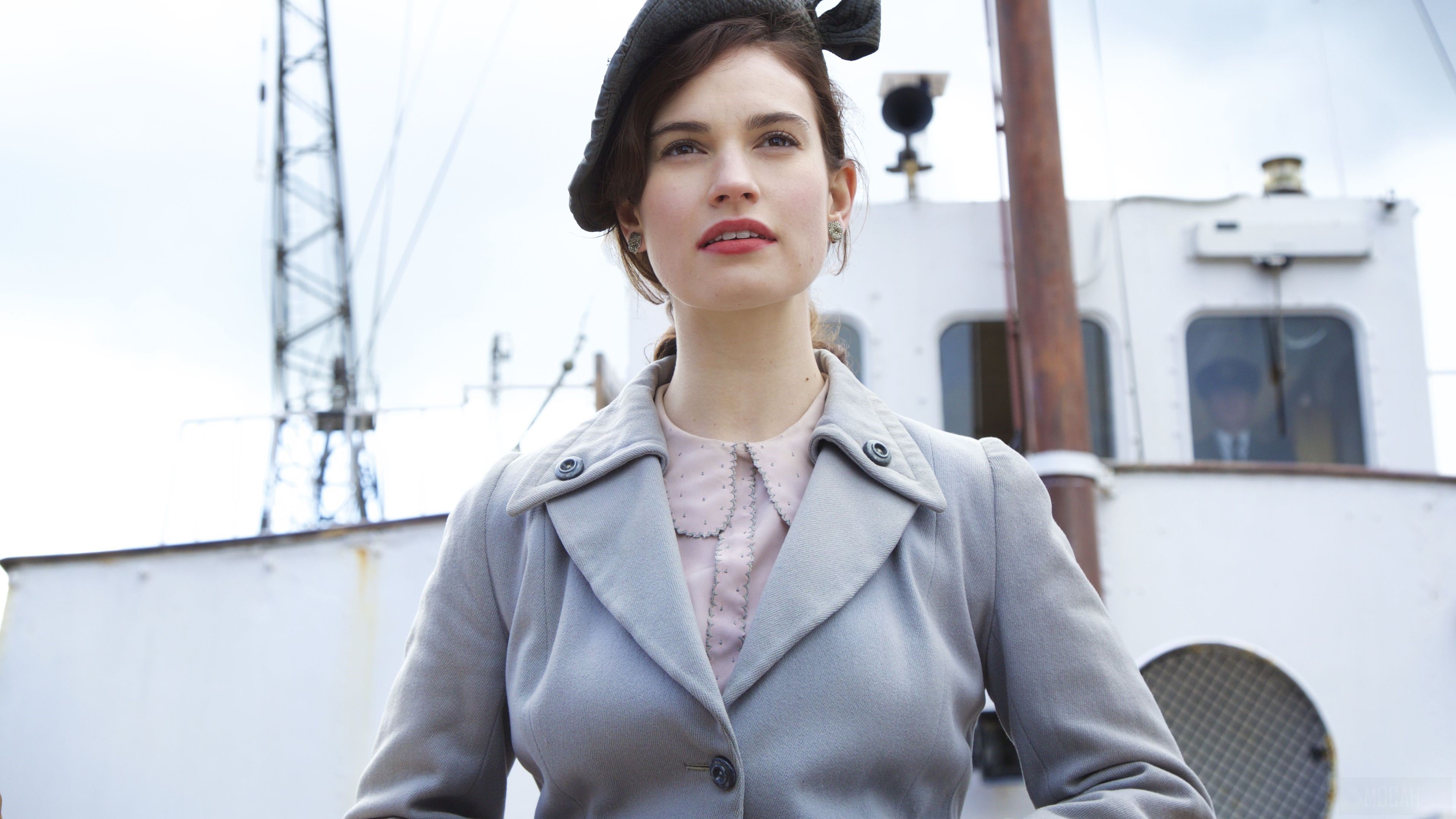 Lily James in a grey coat and hat HD Wallpaper