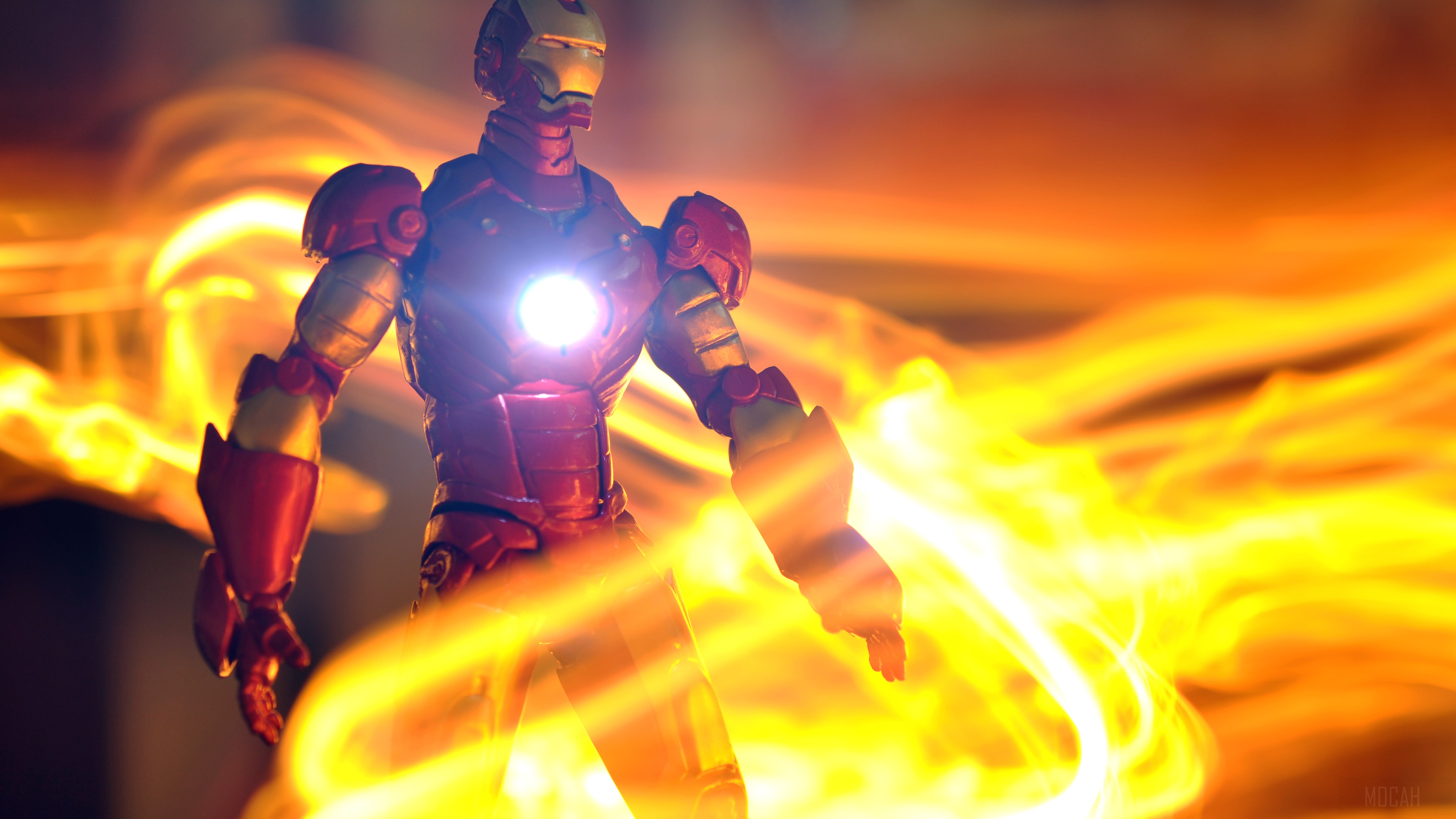Iron Man toy with fiery background HD Wallpaper