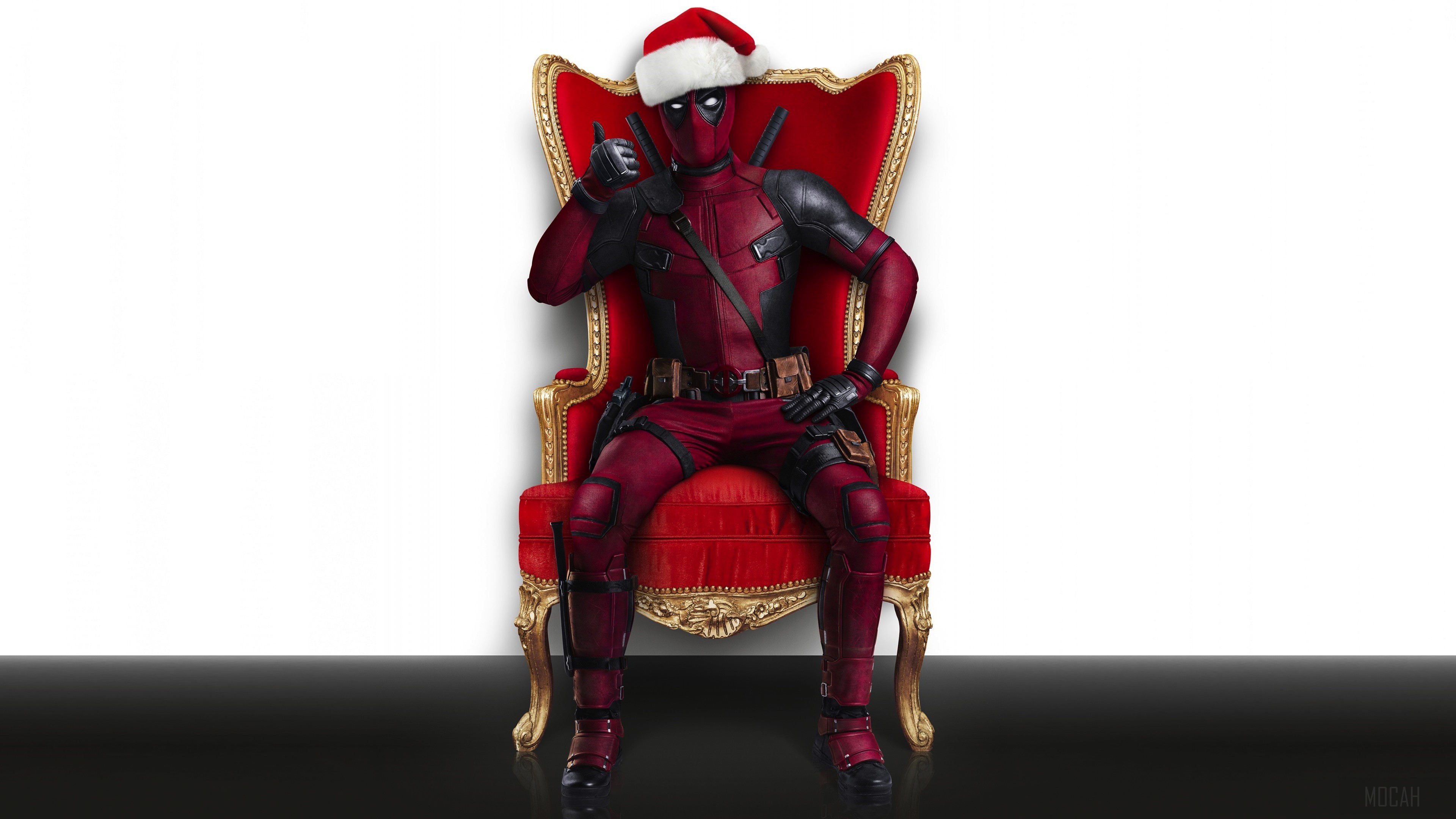 Deadpool in Santa hat sitting on throne 4K HD Wallpaper