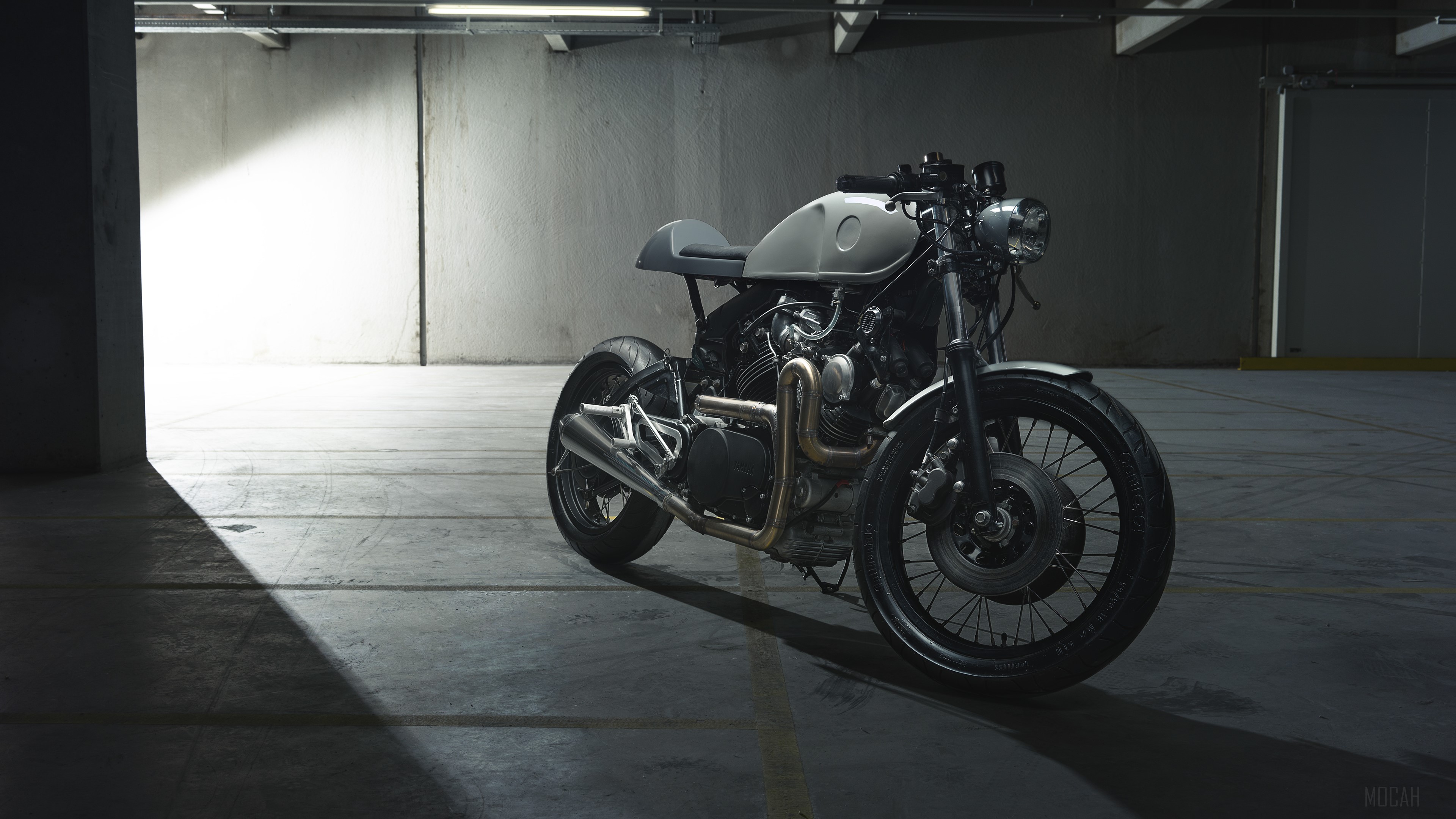 Yamaha XV750 motorcycle in a parking garage 4K HD Wallpaper