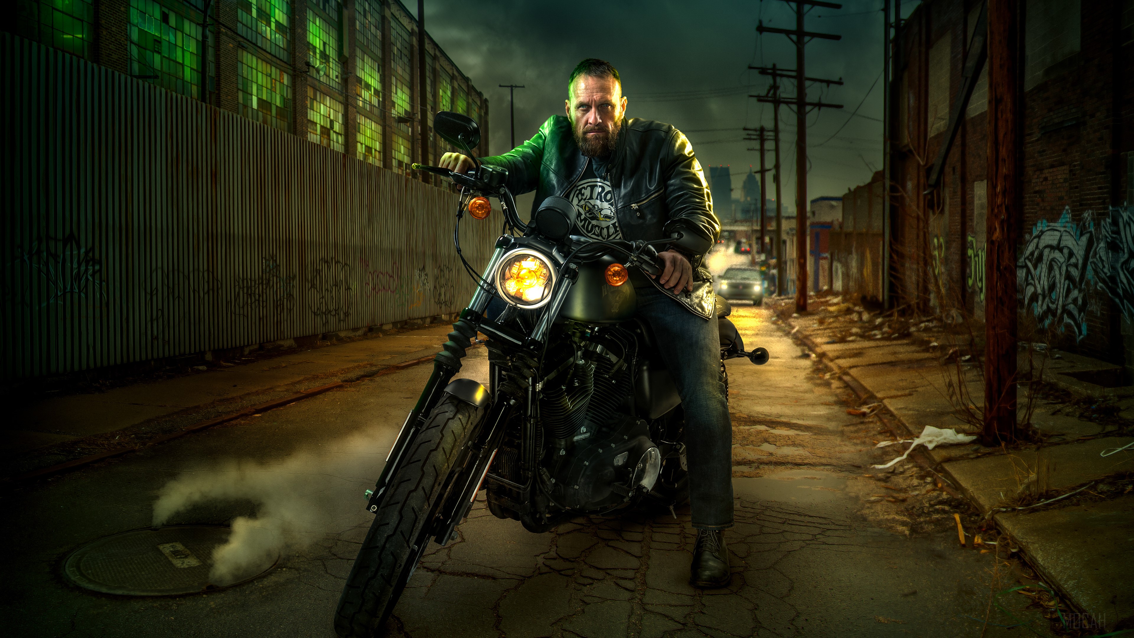 Man on Harley Davidson motorcycle in alley 4K HD Wallpaper
