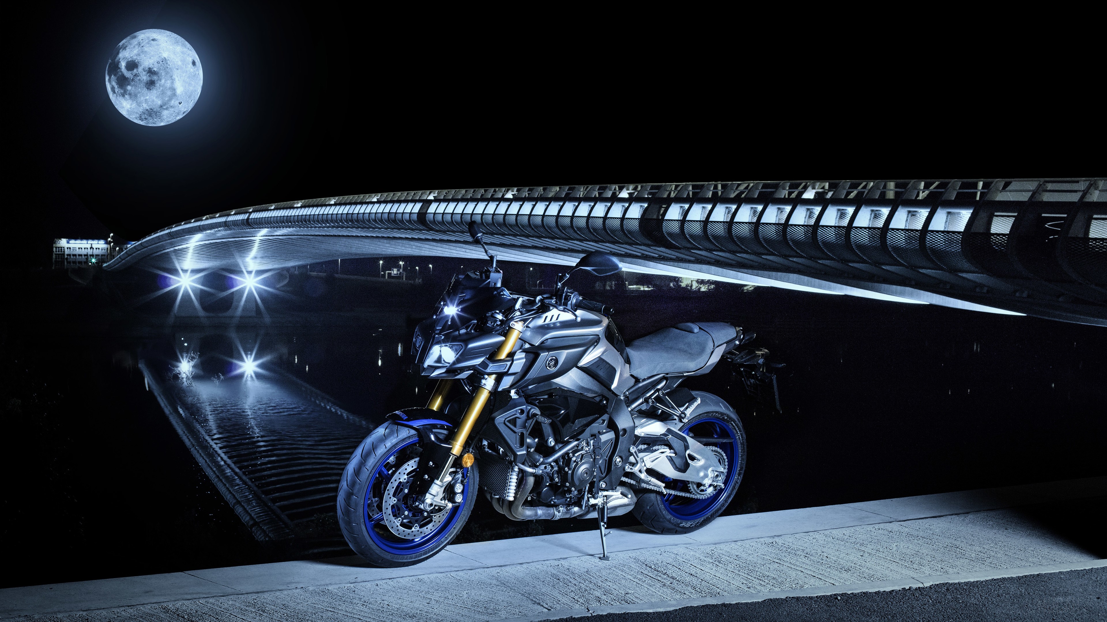 Yamaha MT-10 motorcycle under a bridge at night with moon HD Wallpaper