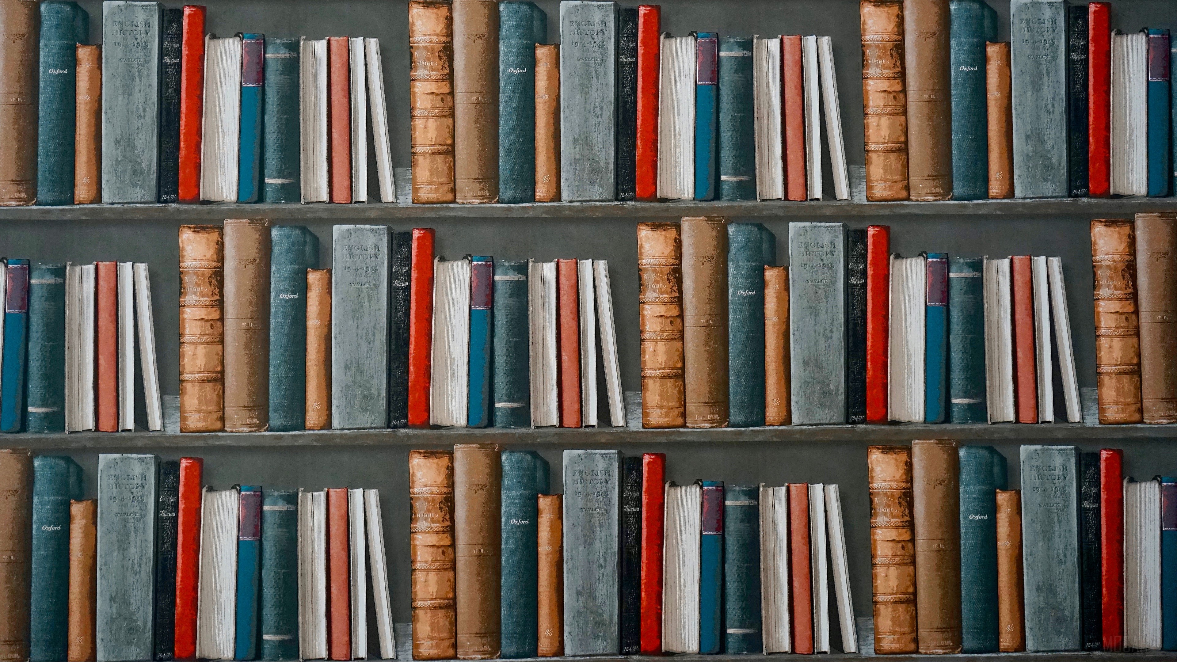 Books on a shelf HD Wallpaper