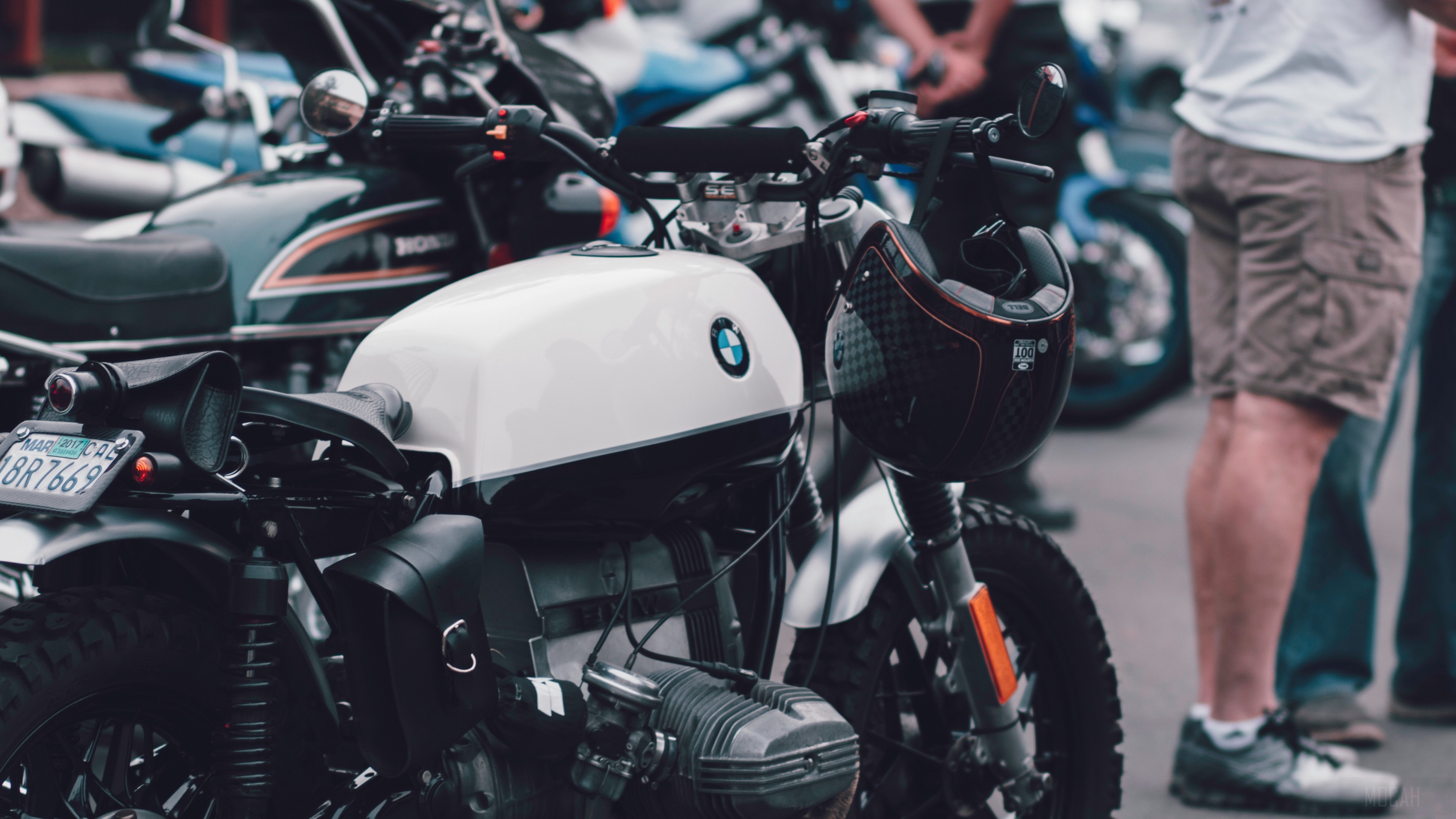 BMW motorcycle with helmet and people HD Wallpaper