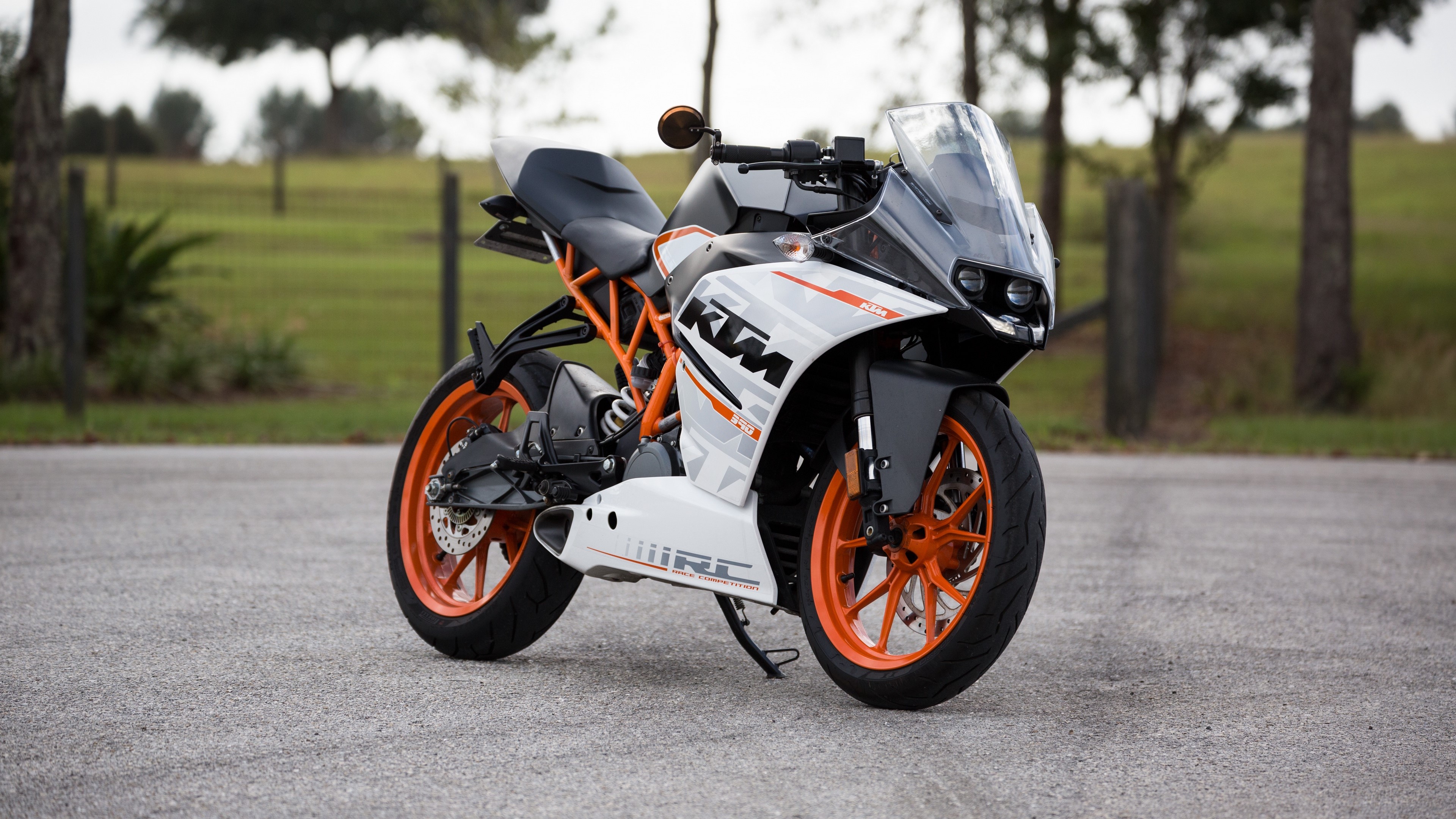 KTM RC 390 motorcycle side view 4K HD Wallpaper