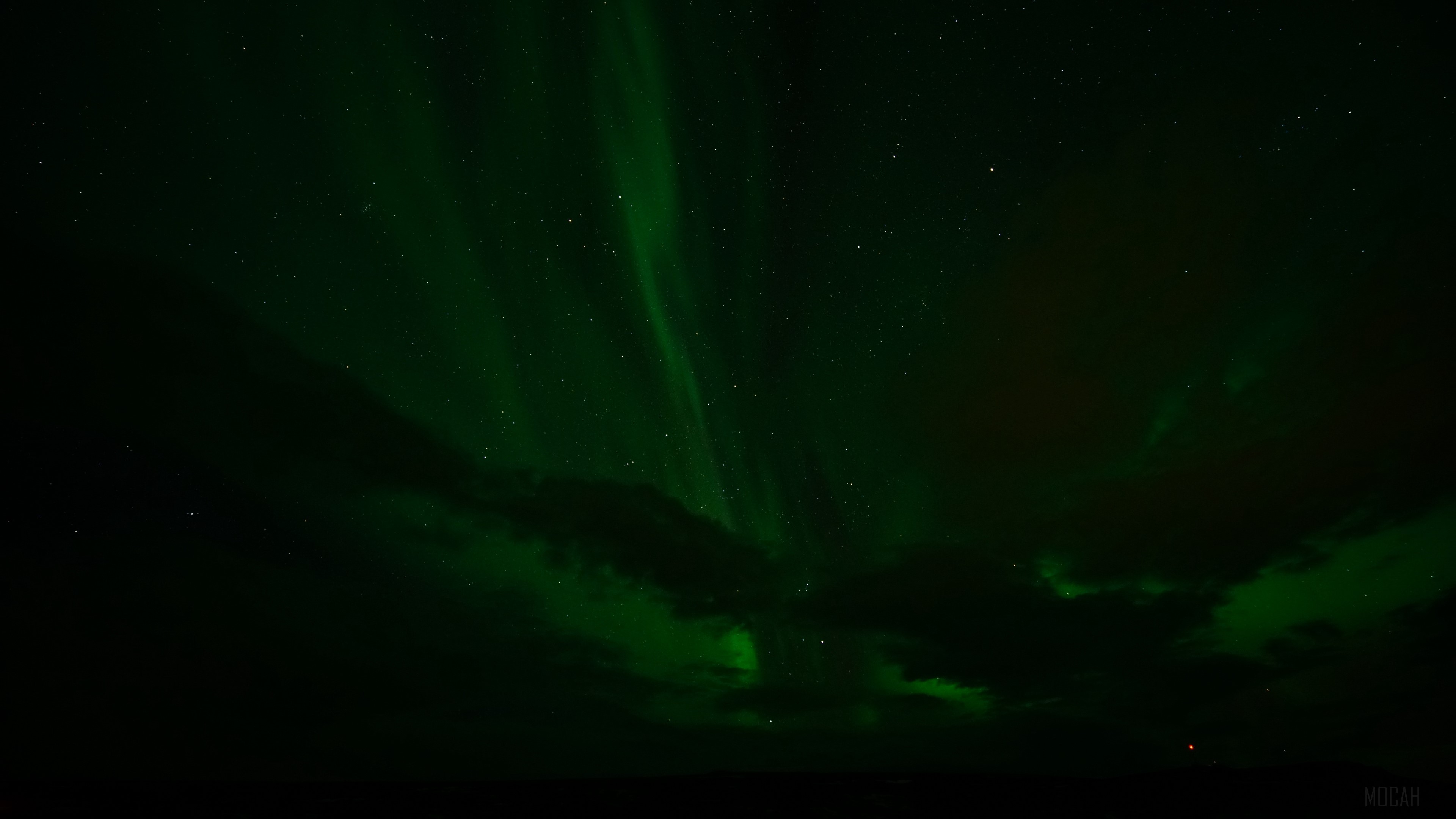 Aurora Borealis over starry sky with clouds HD Wallpaper
