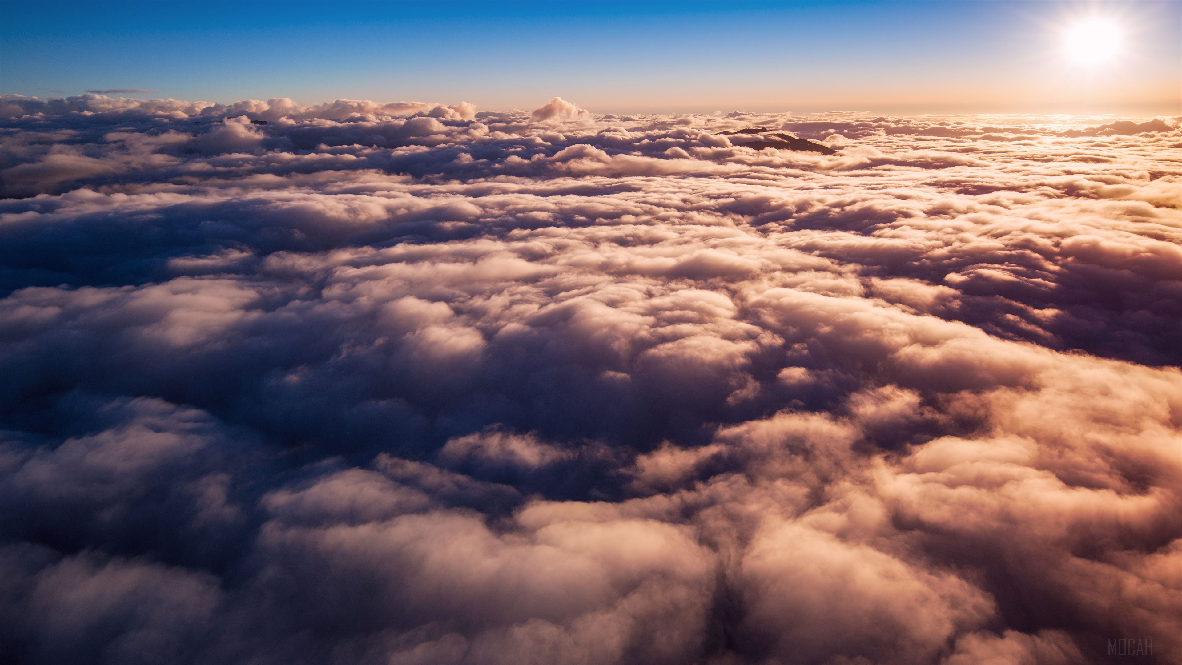 Sunrise over clouds 4K HD Wallpaper