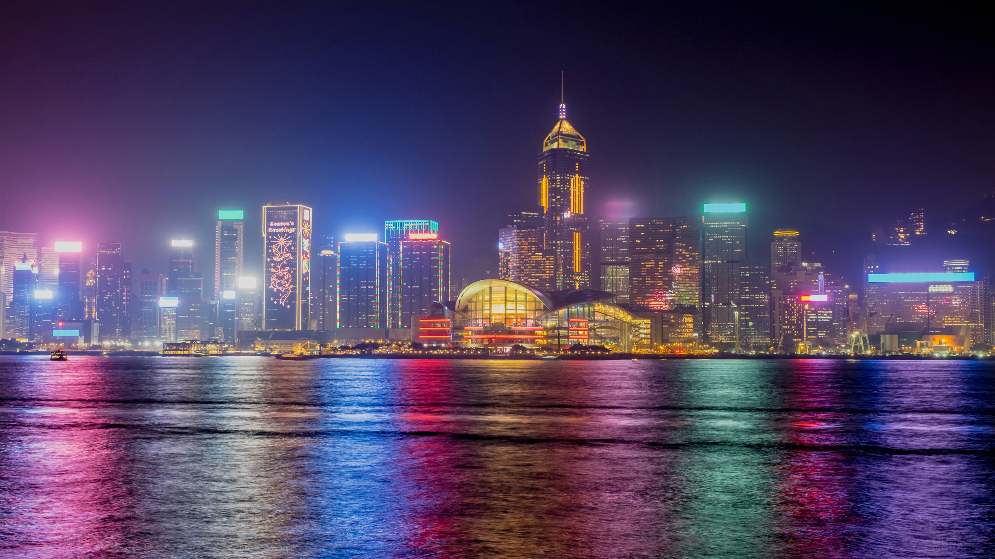 Hong Kong Skyline at Night with Harbor Reflections 4K HD Wallpaper