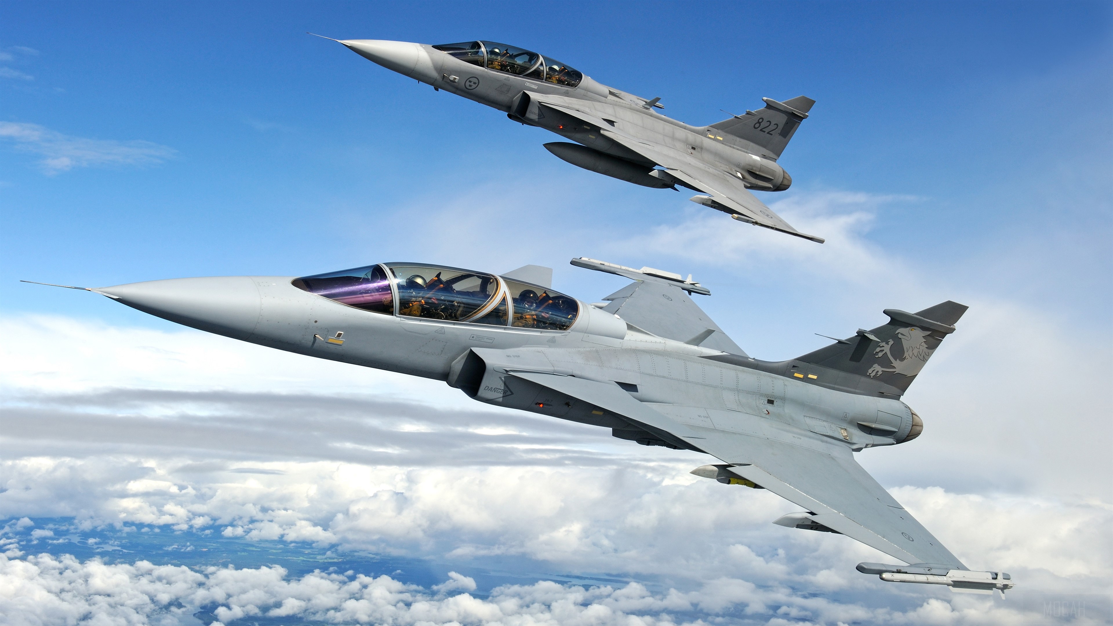 Two Saab JAS 39 Gripen fighter jets in flight HD Wallpaper