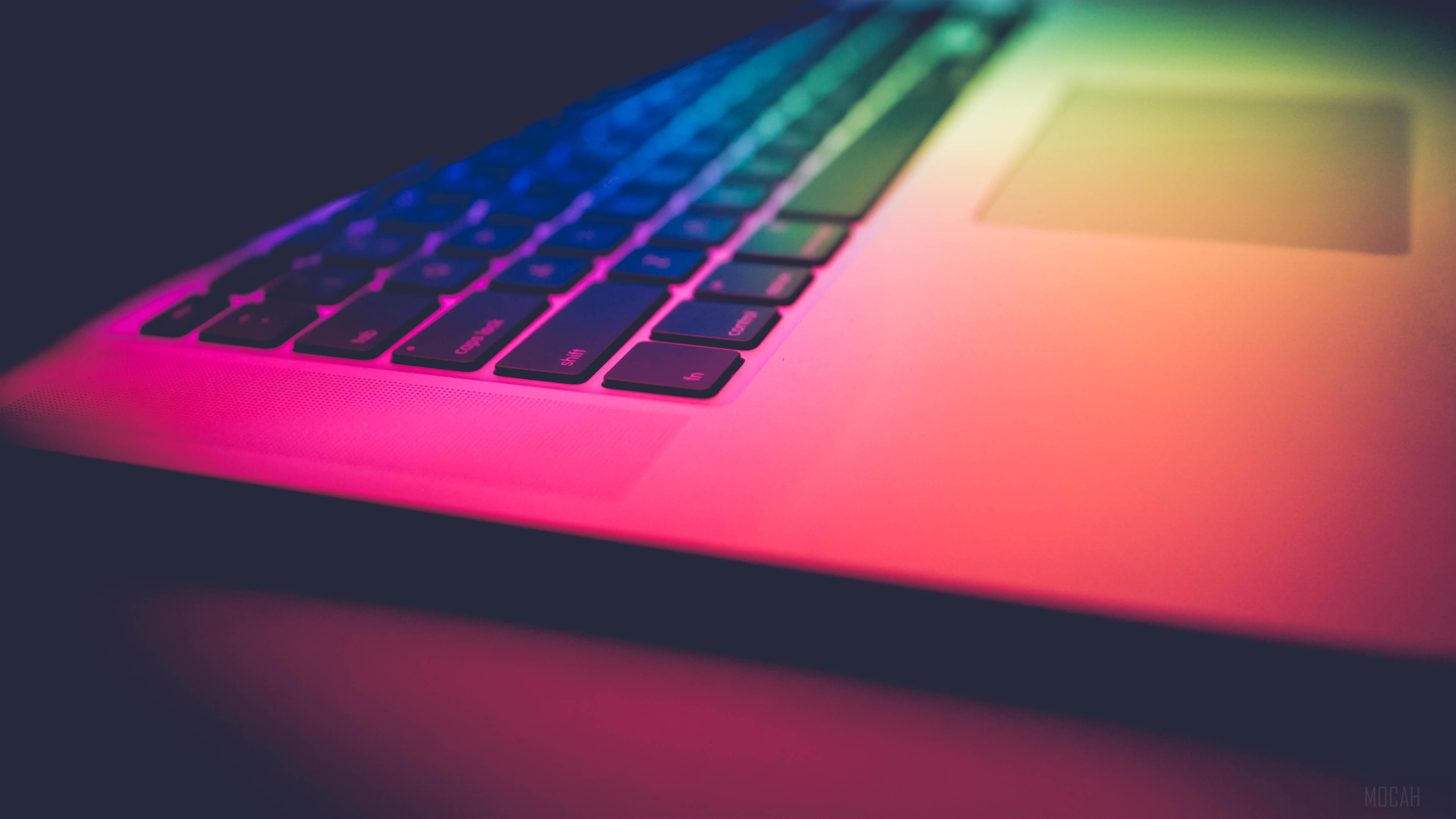 Apple MacBook keyboard with colorful lighting HD Wallpaper