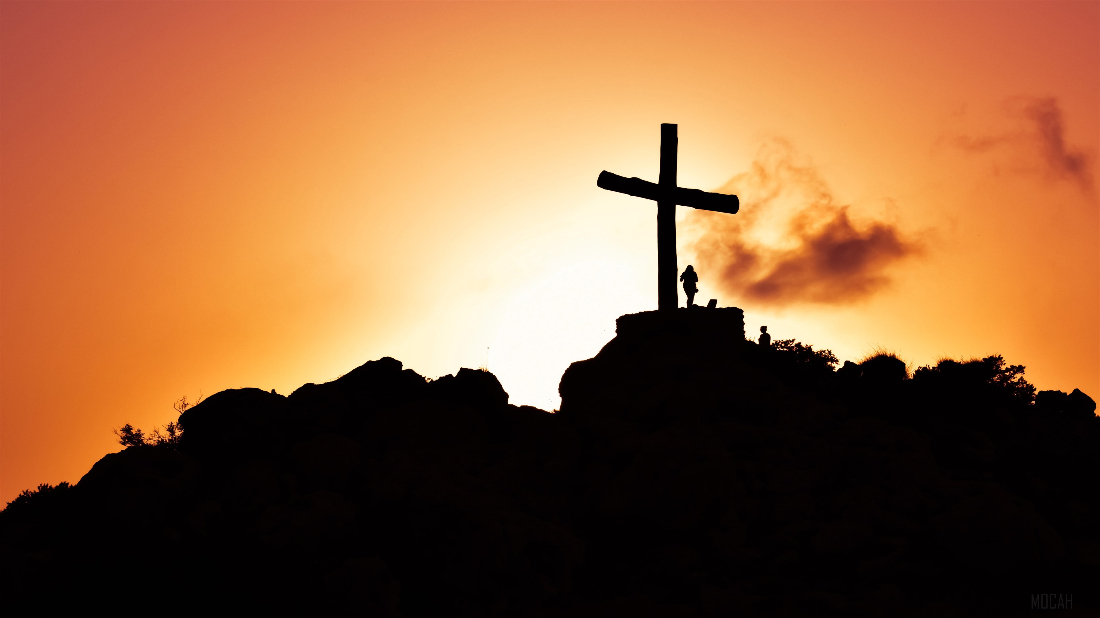 Cross silhouette on a hill at sunset HD Wallpaper