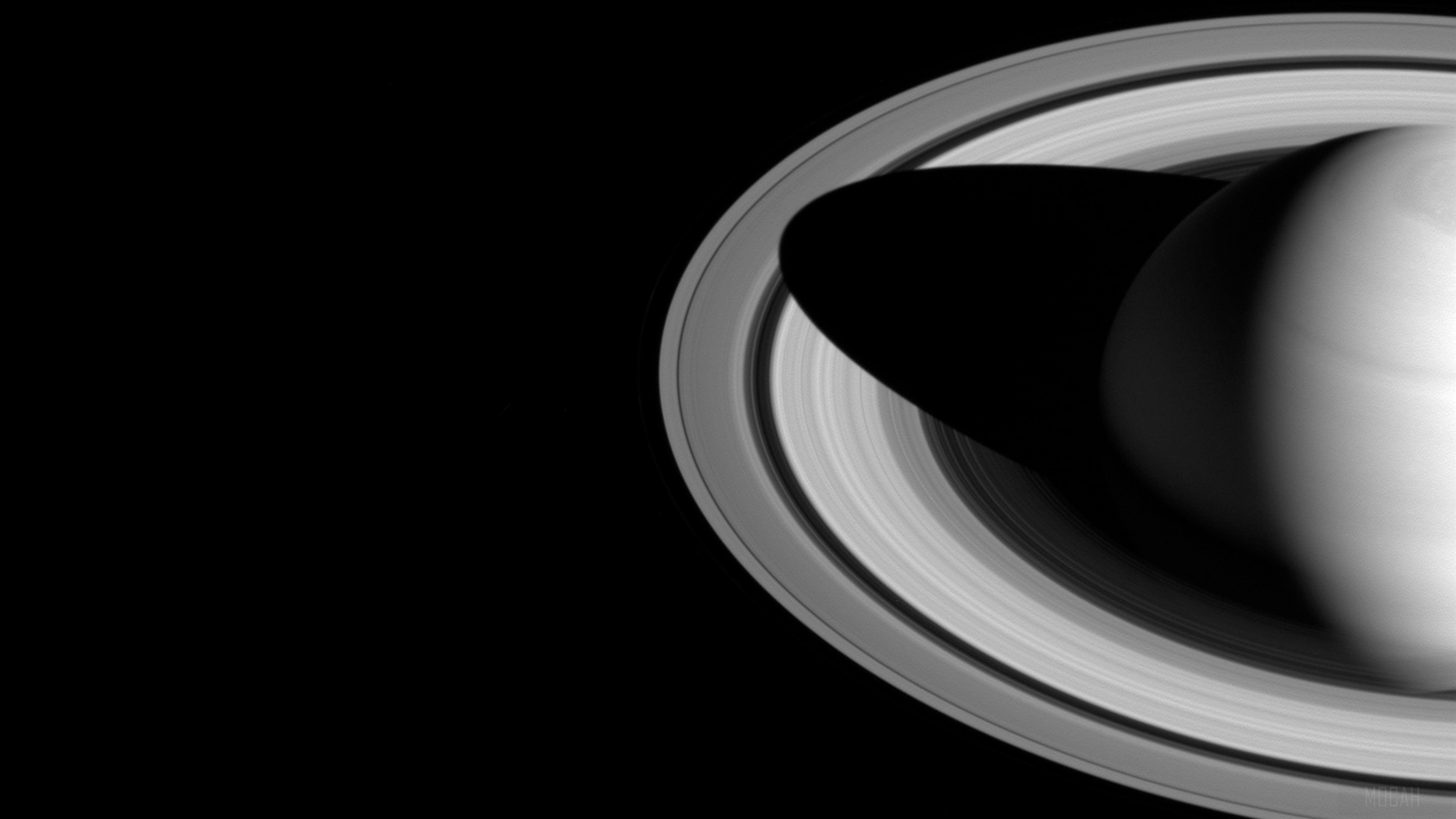 Saturn and its rings HD Wallpaper