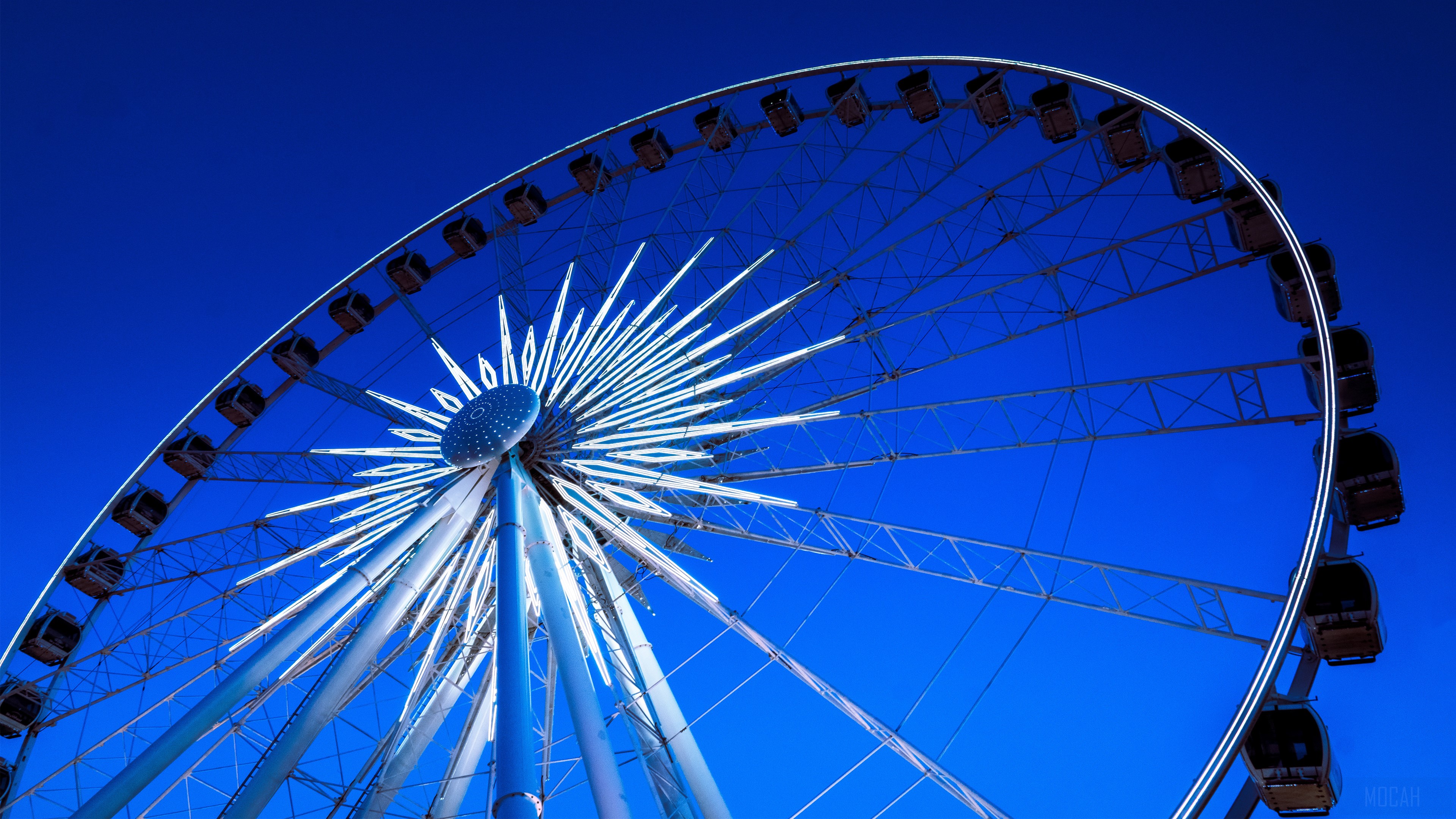 Ferris Wheel against a clear blue sky HD Wallpaper