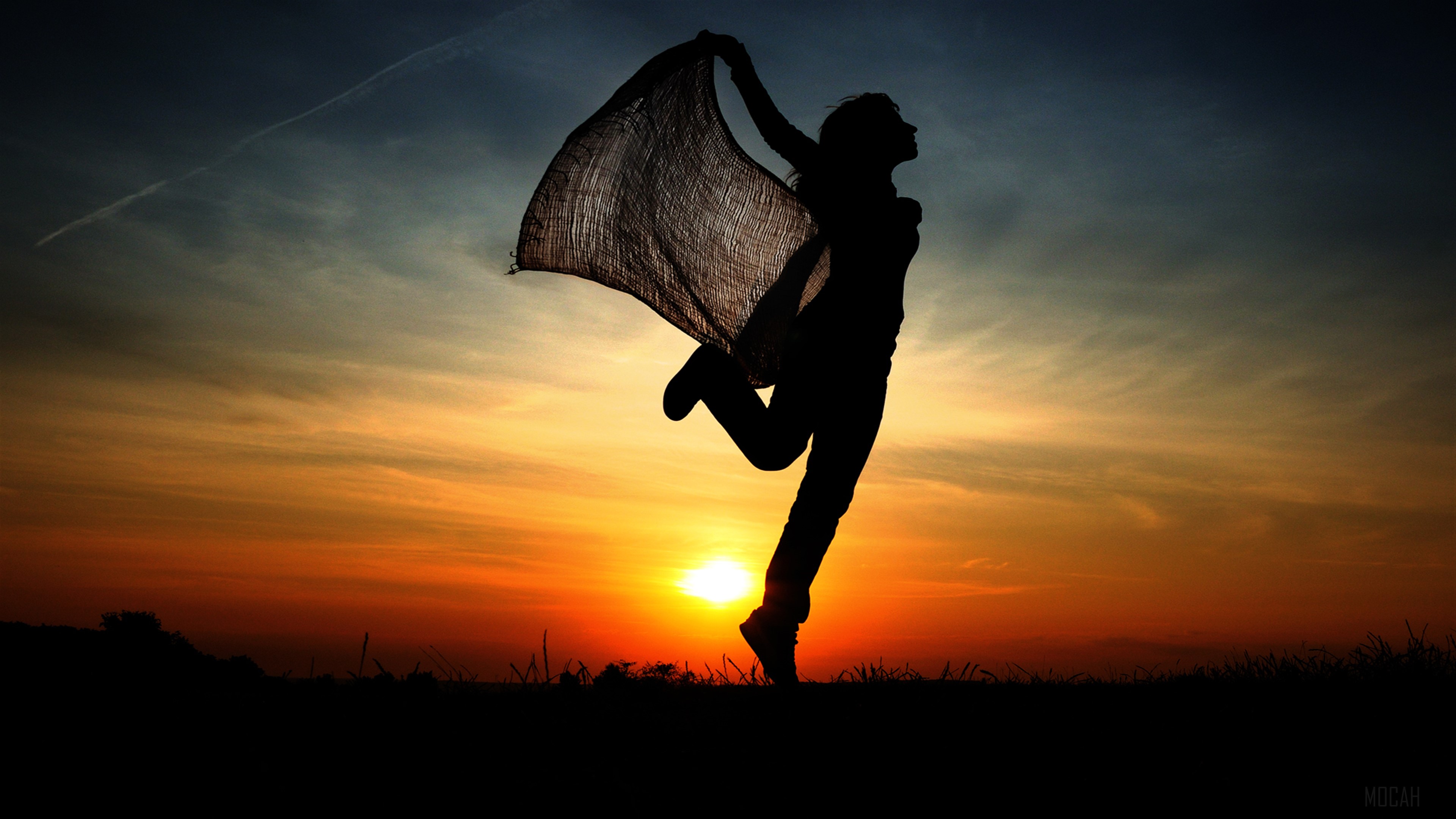 Silhouette of a woman dancing at sunrise 4K HD Wallpaper