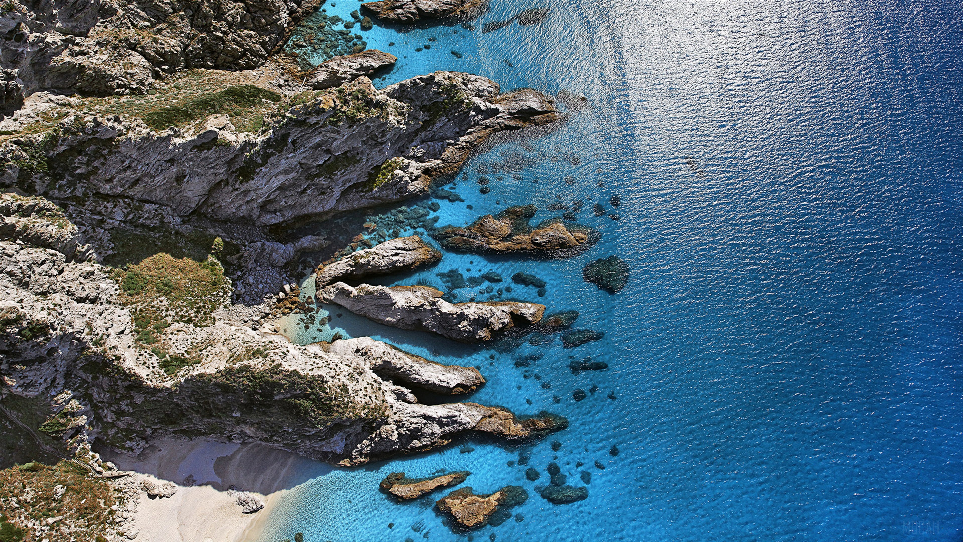 Aerial view of rocky coast and blue sea at Capo Vaticano, Italy 4K HD Wallpaper