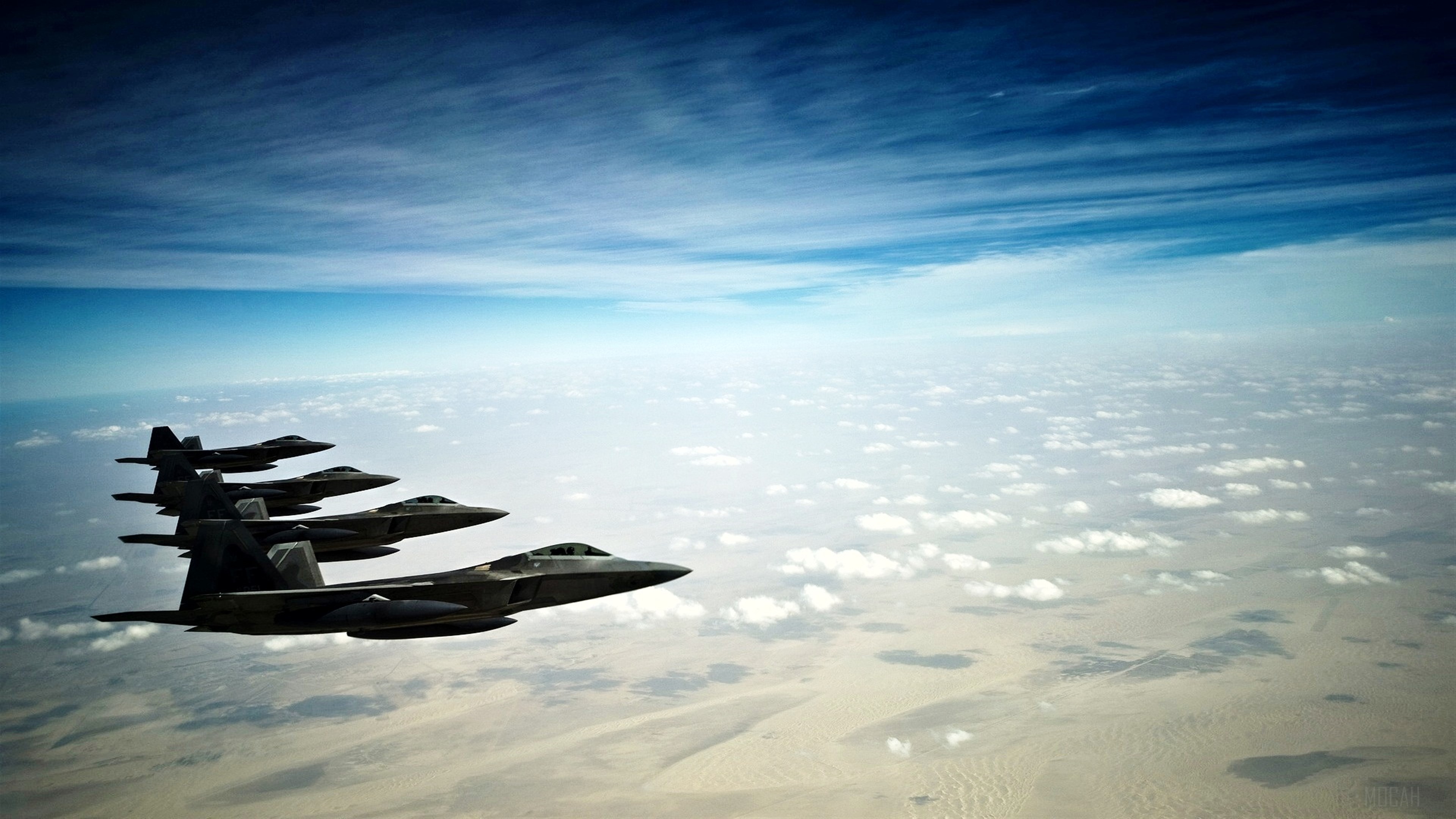 Four F-22 Raptor Stealth Fighters in Formation HD Wallpaper