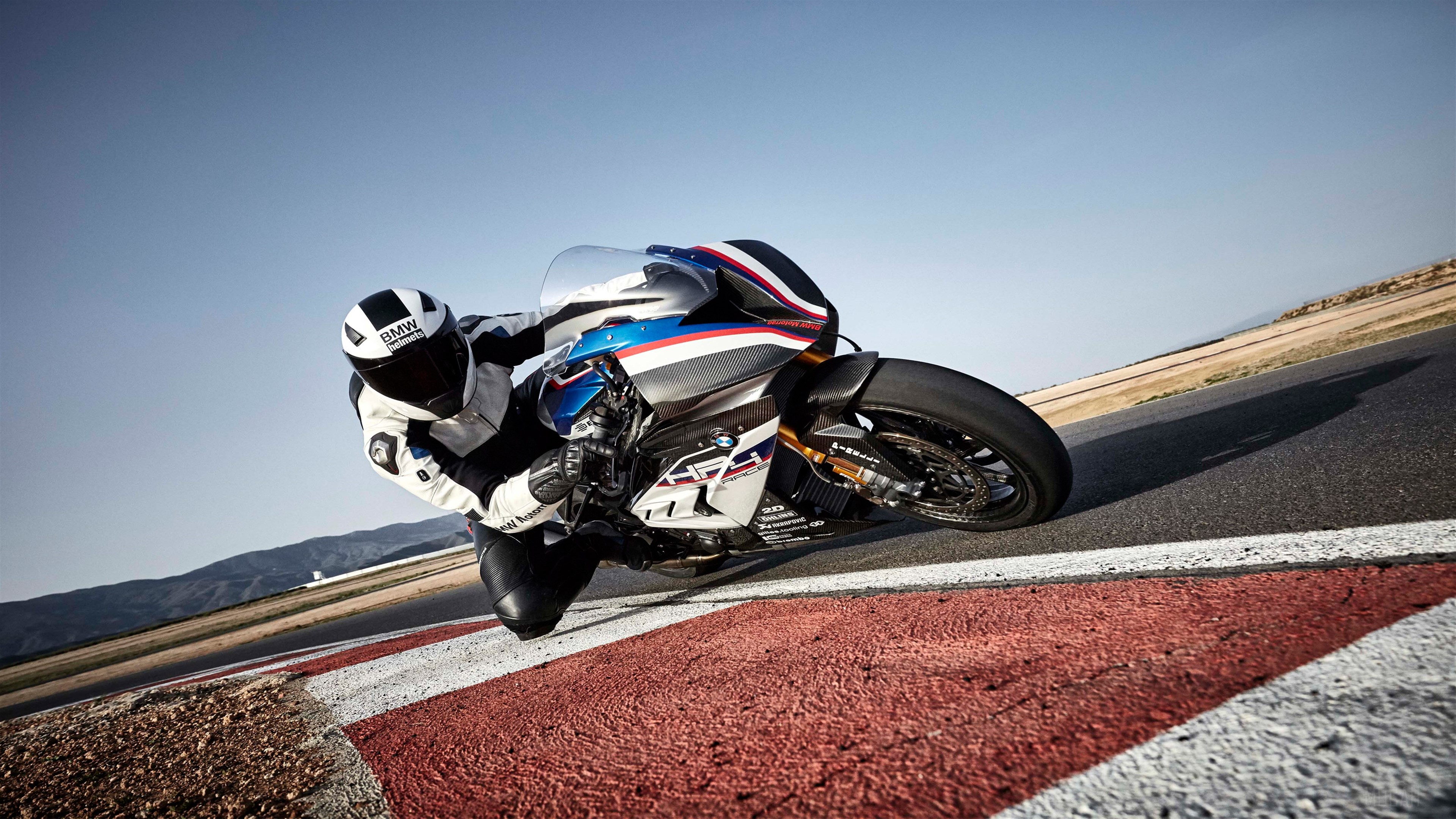 BMW HP4 Race motorcycle on a track HD Wallpaper