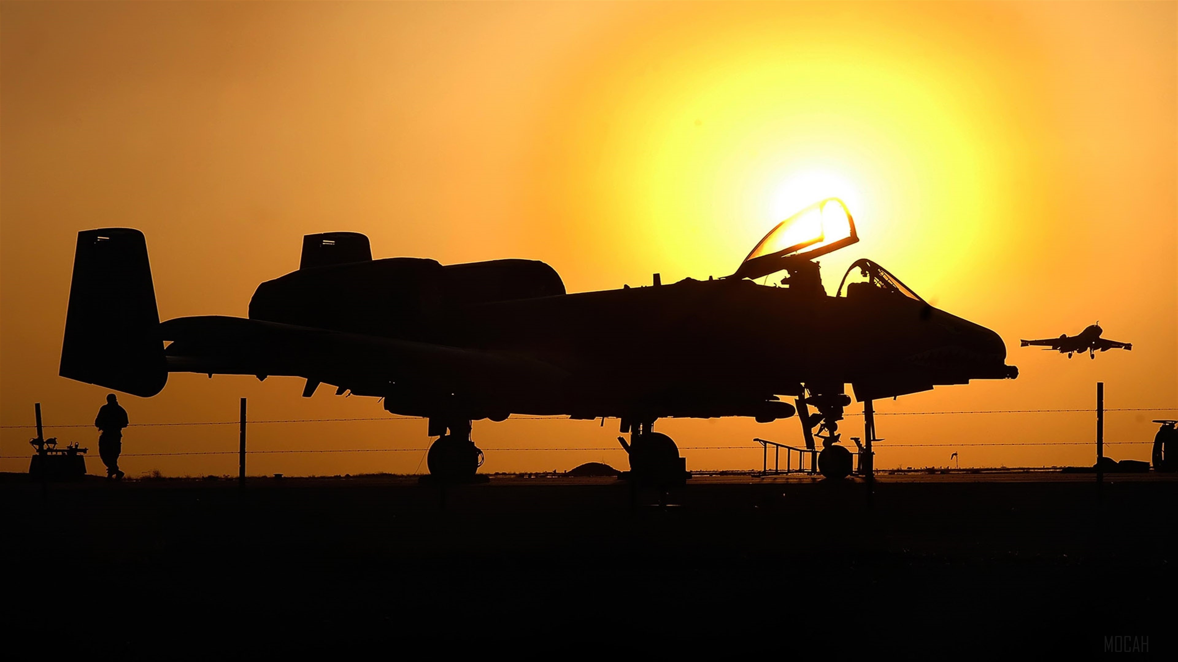 Silhouette of A-10 Warthog aircraft at sunset HD Wallpaper