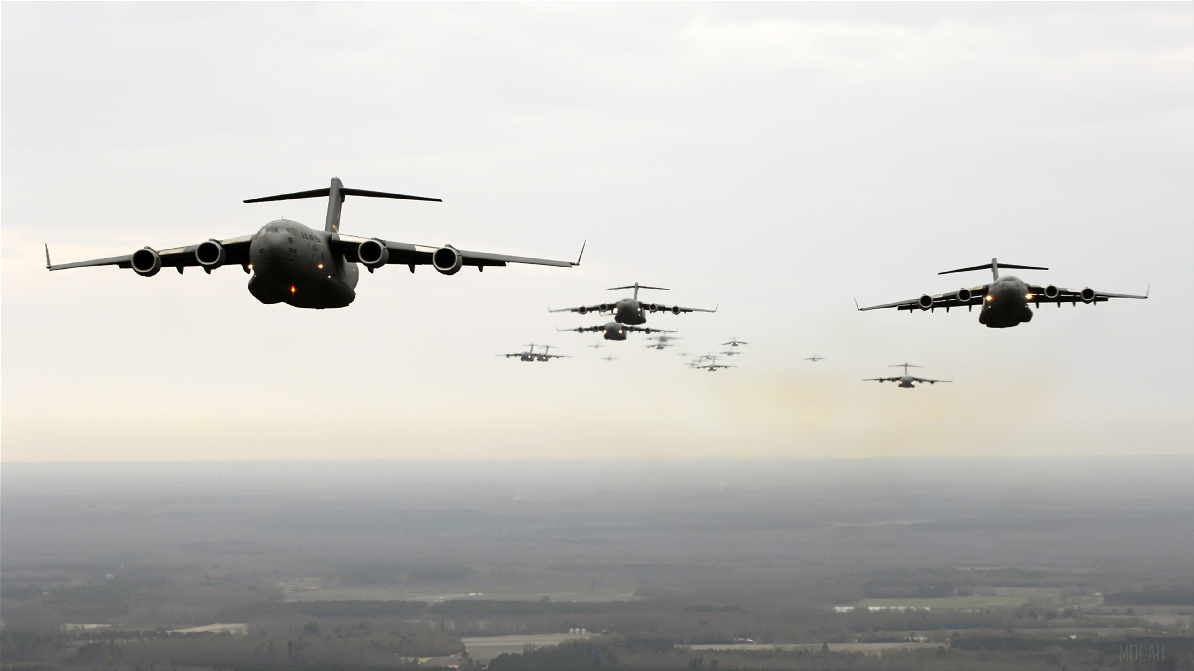 Twenty C-17 Globemaster IIIs in formation 4K HD Wallpaper