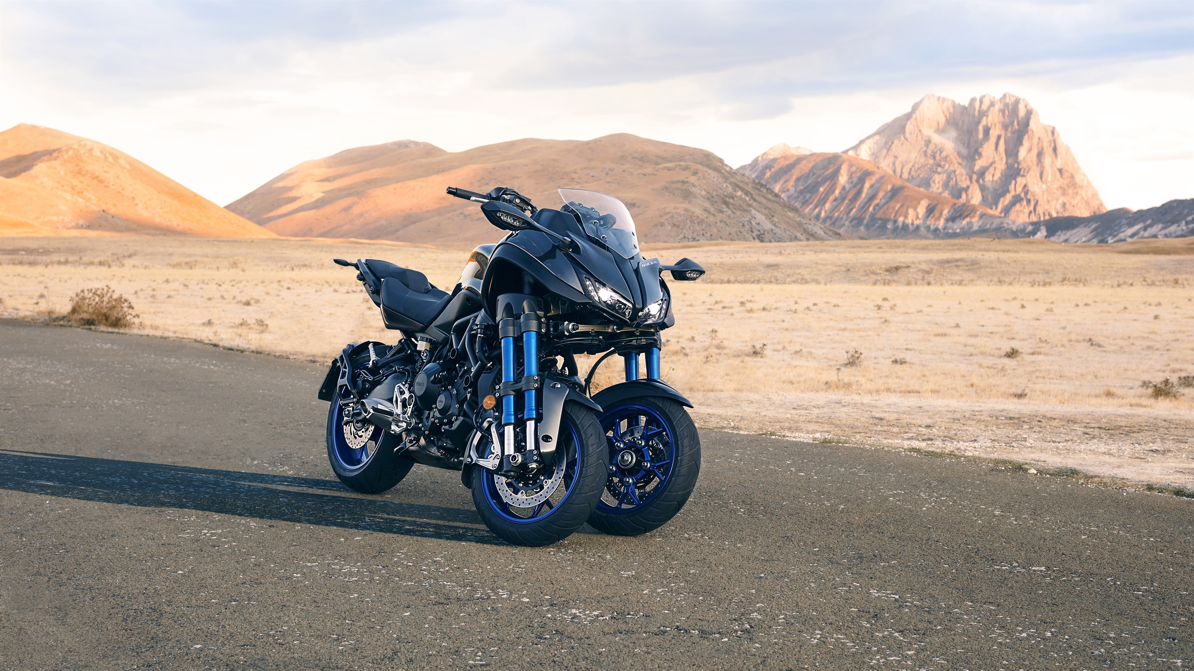 Yamaha Niken motorcycle in a desert landscape HD Wallpaper