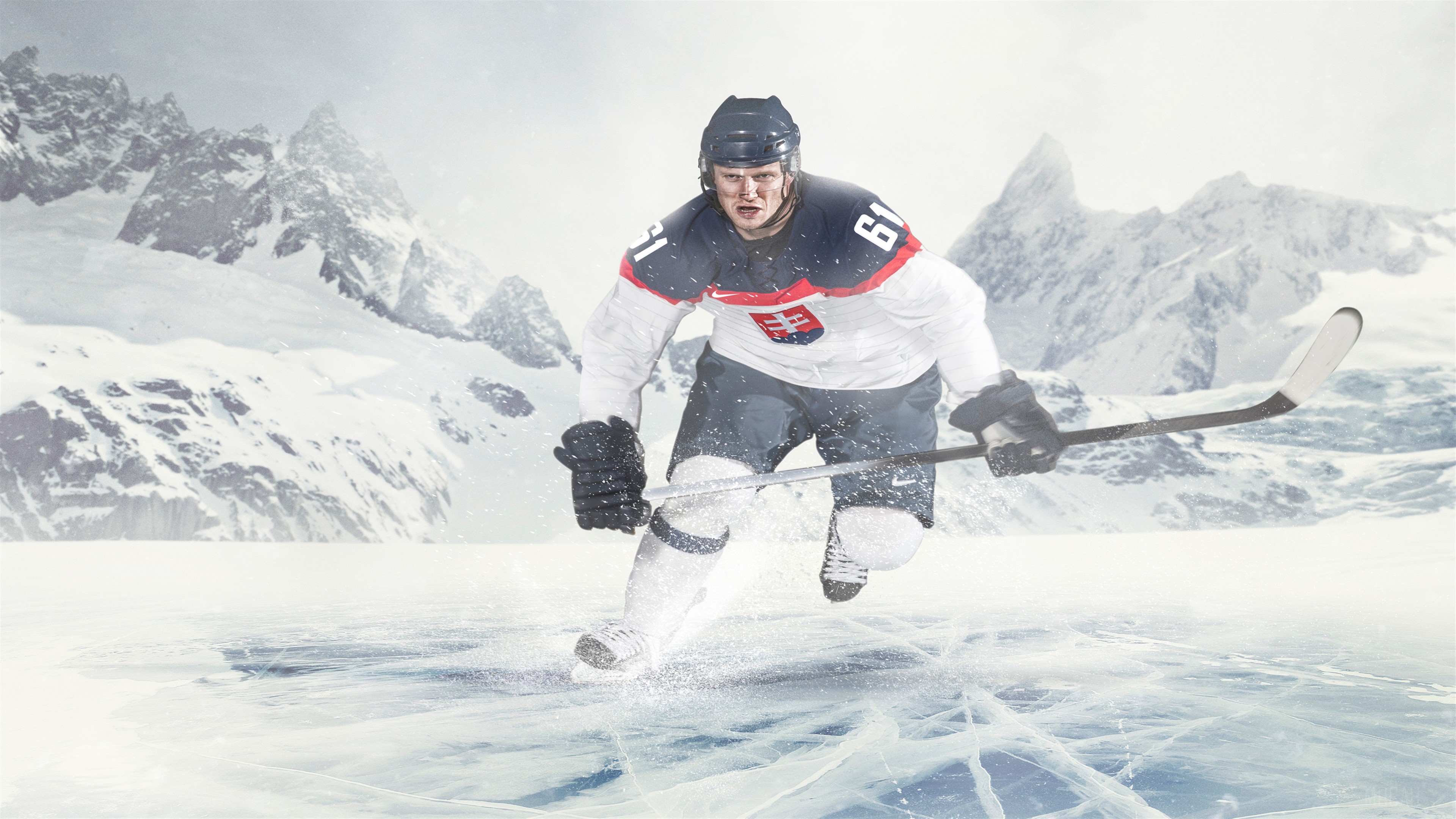 Ice Hockey Player in Snowy Mountains 4K HD Wallpaper