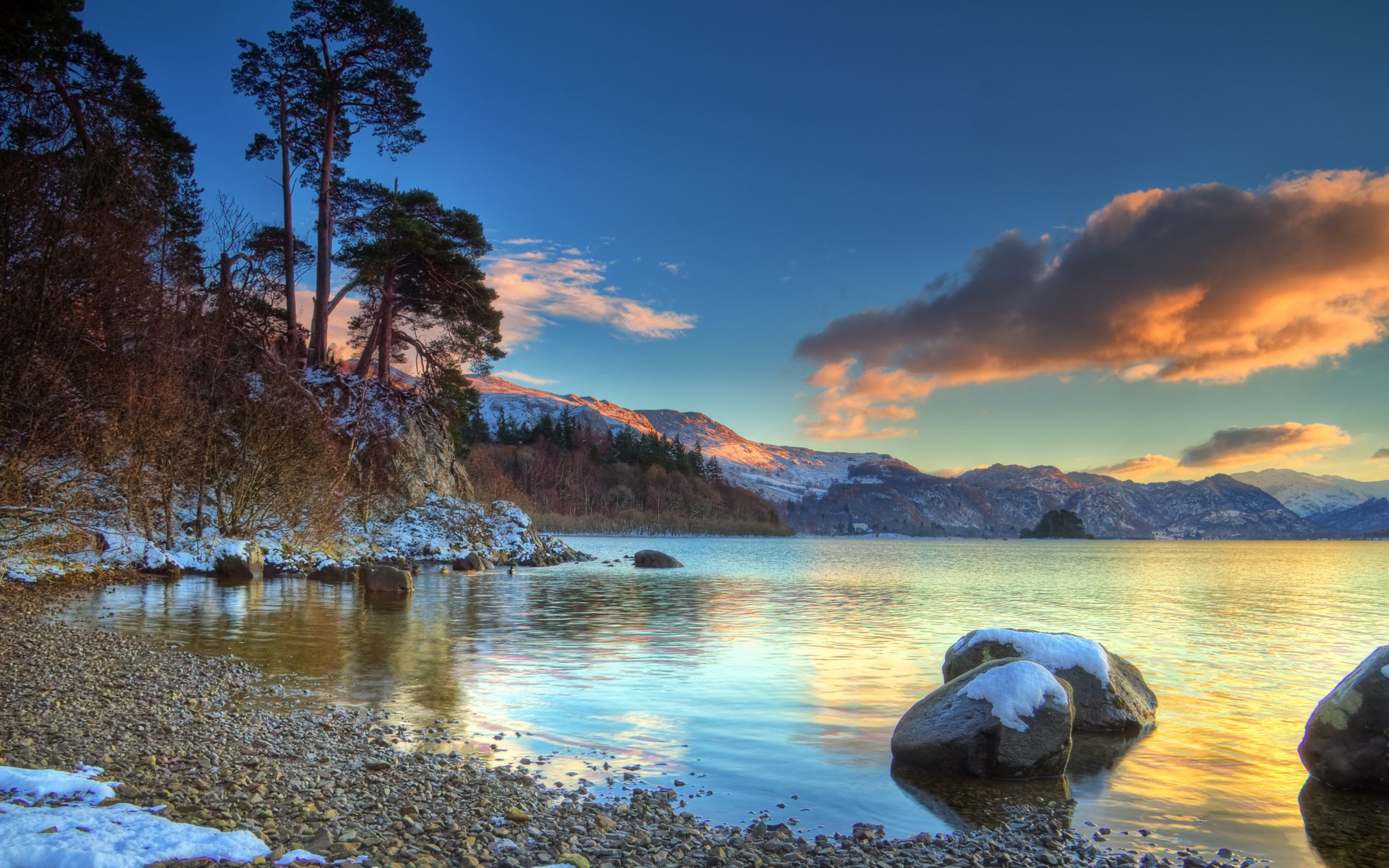 Winter lake landscape with snow-capped mountains and trees HD Wallpaper