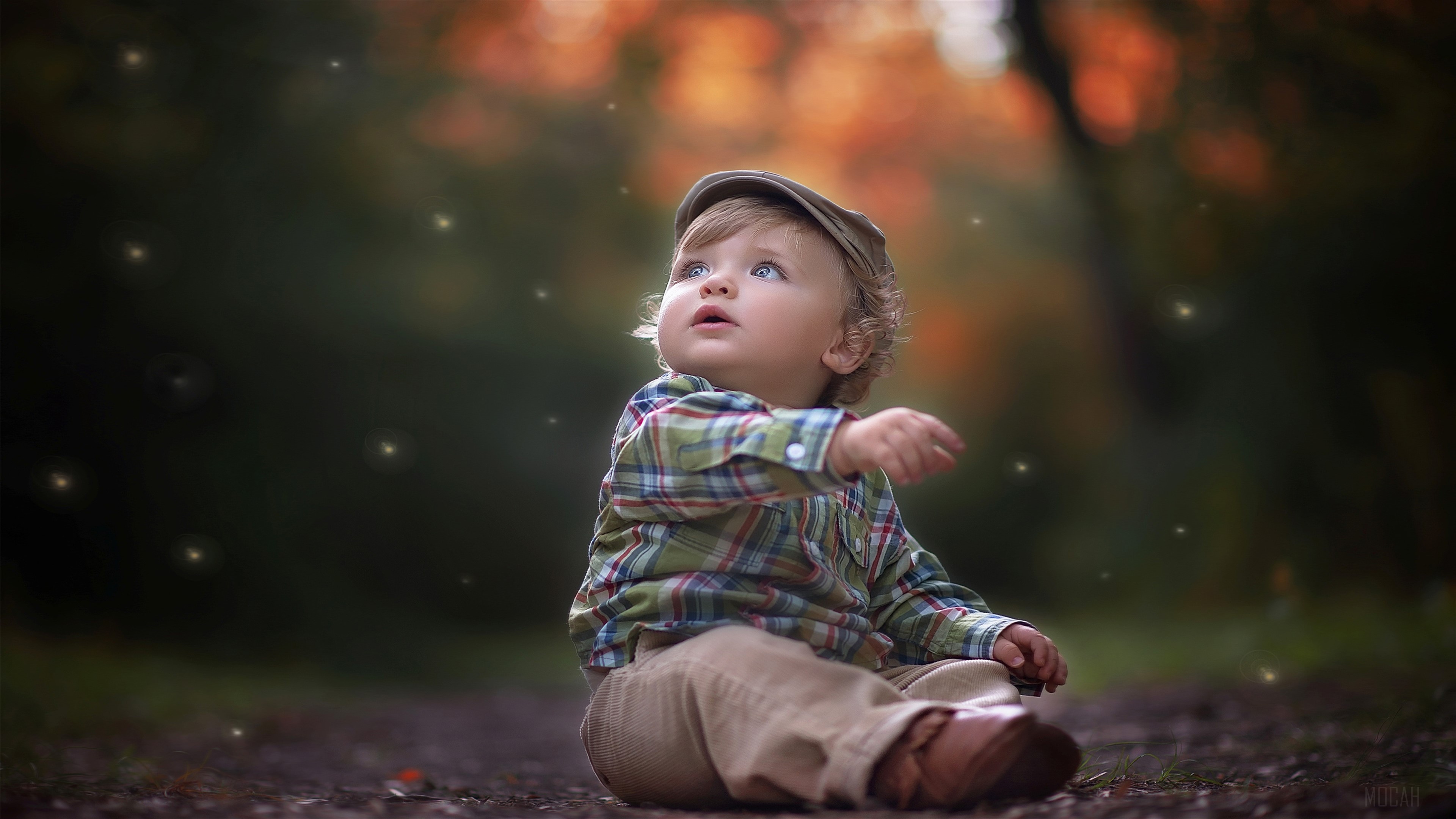 Cute Little Boy in a Cap Looking Up 4K HD Wallpaper