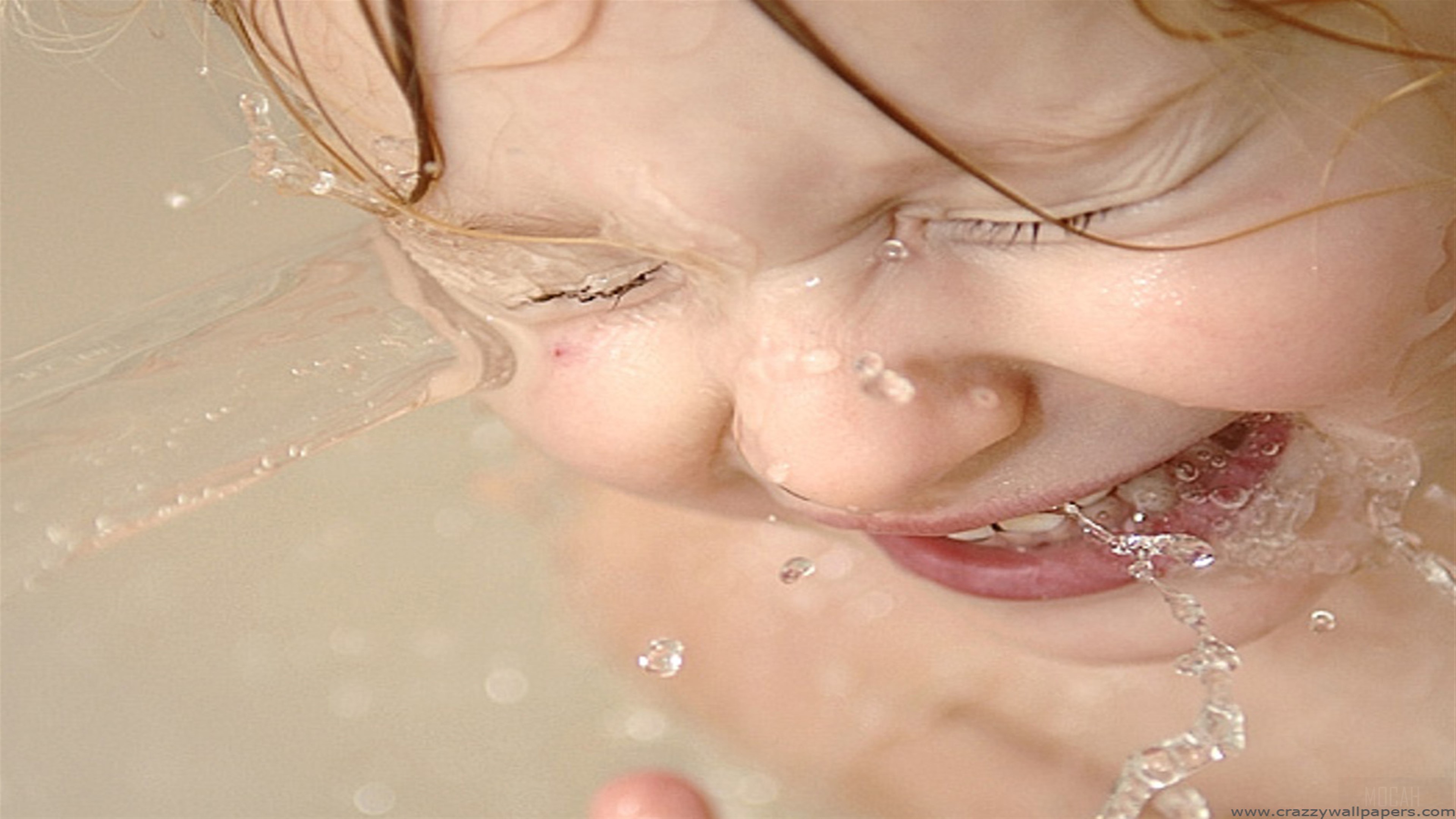 Cute baby playing with water 4K HD Wallpaper