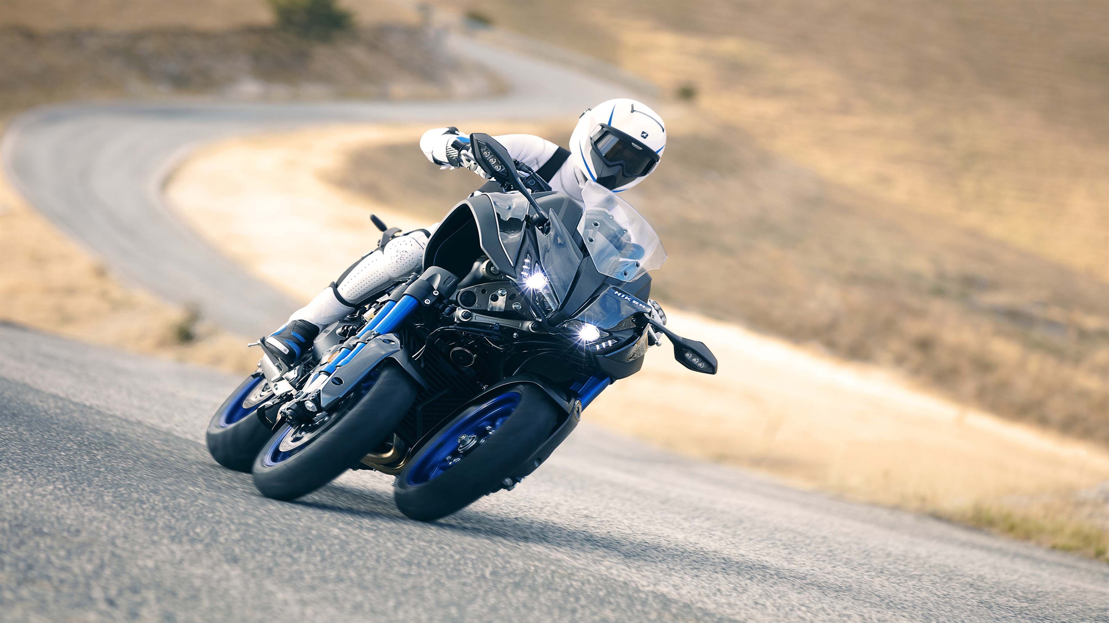2019 Yamaha Niken motorcycle on a winding road HD Wallpaper
