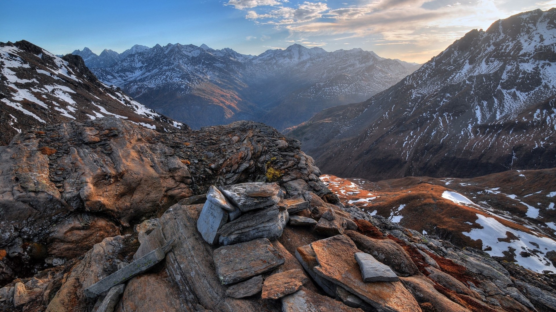 Rocky mountain landscape with snow and valley HD Wallpaper