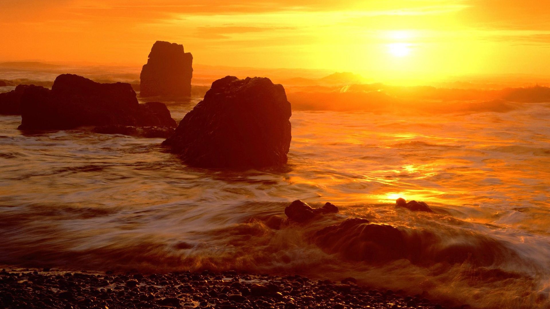 Sunset over rocky ocean coast HD Wallpaper