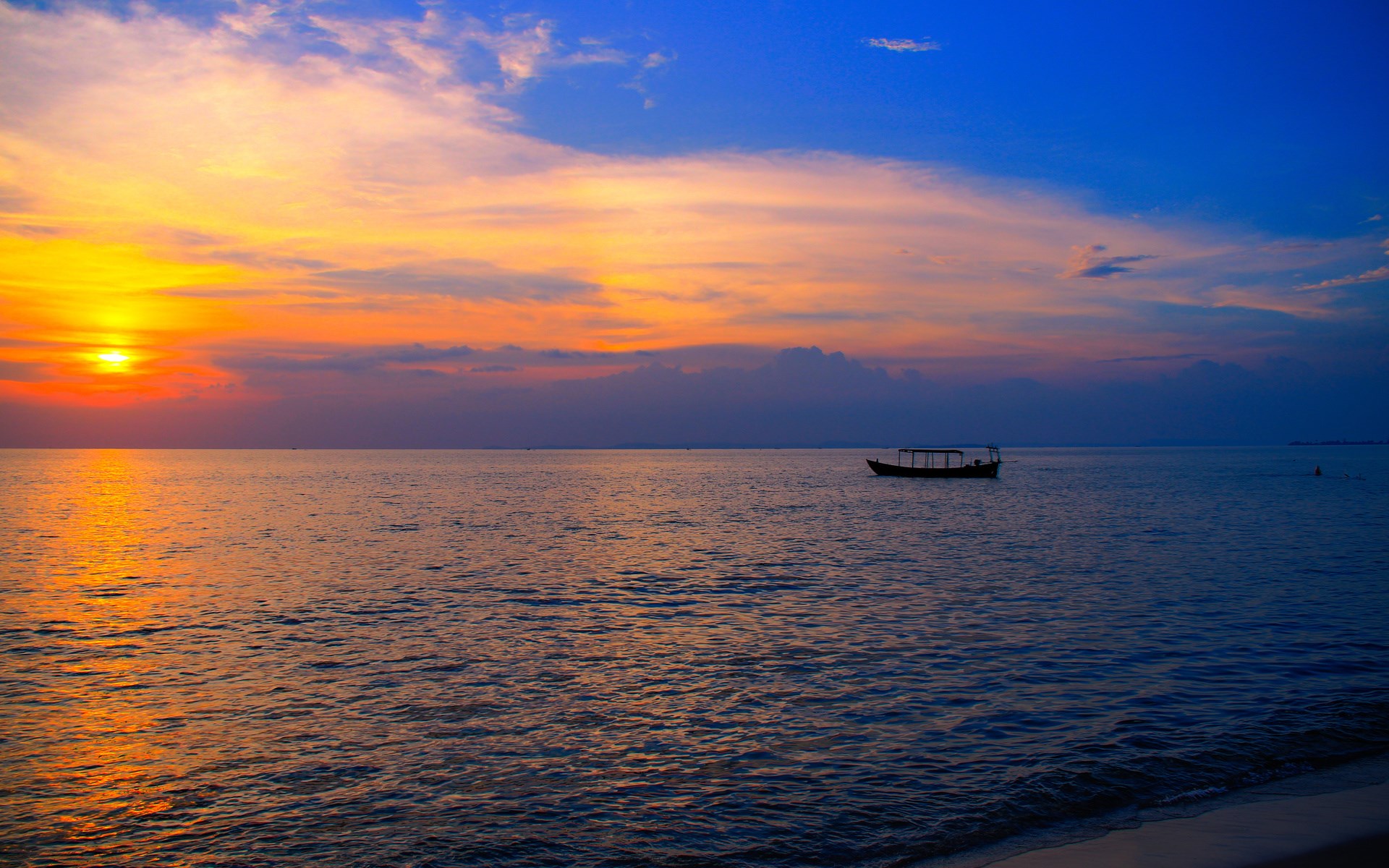 Boat on the ocean at sunset HD Wallpaper