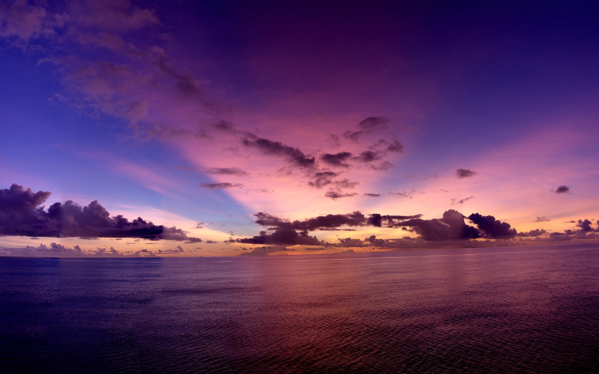 Ocean and sky at sunset with colorful clouds HD Wallpaper