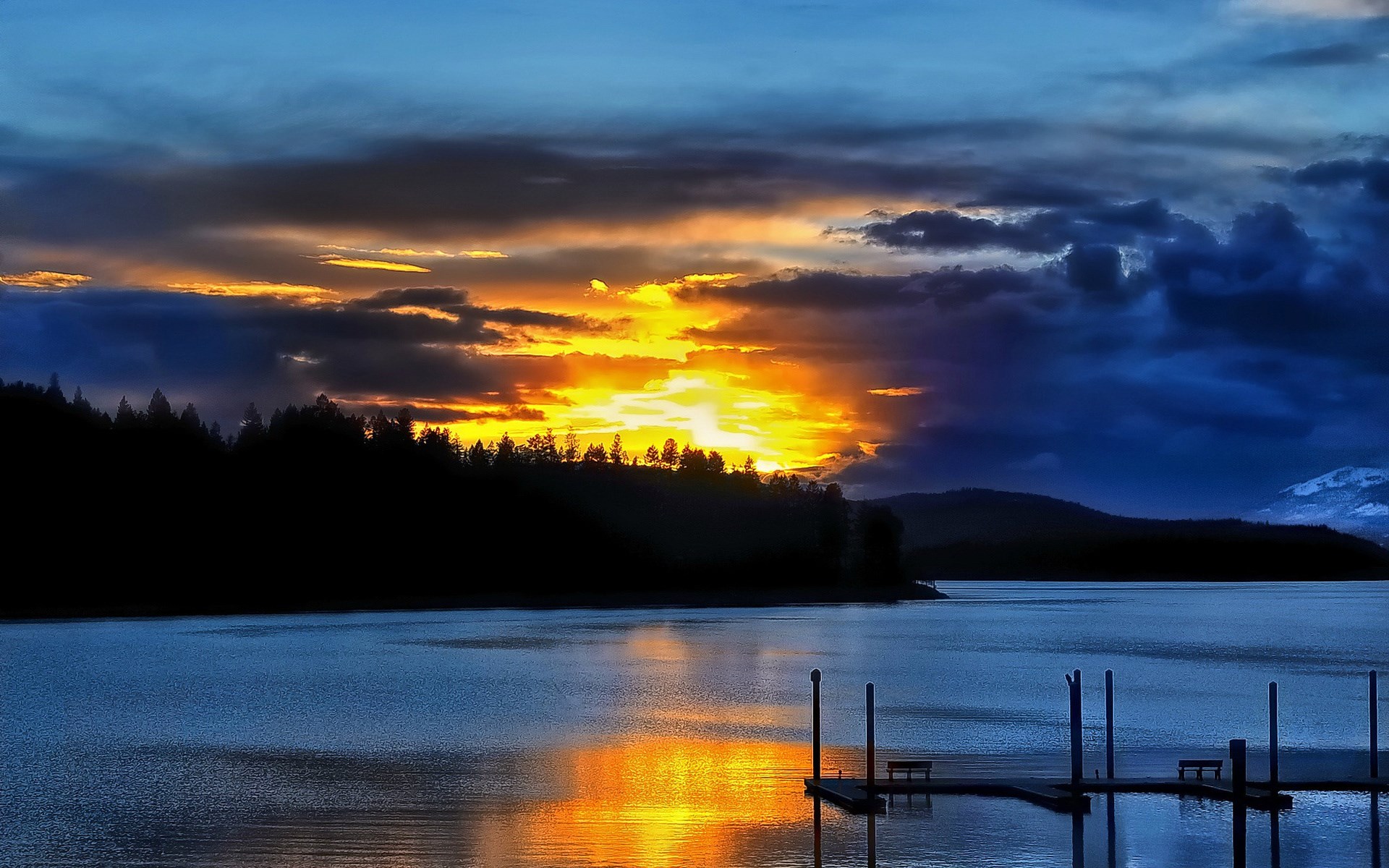 Sunset over a lake with a dock HD Wallpaper