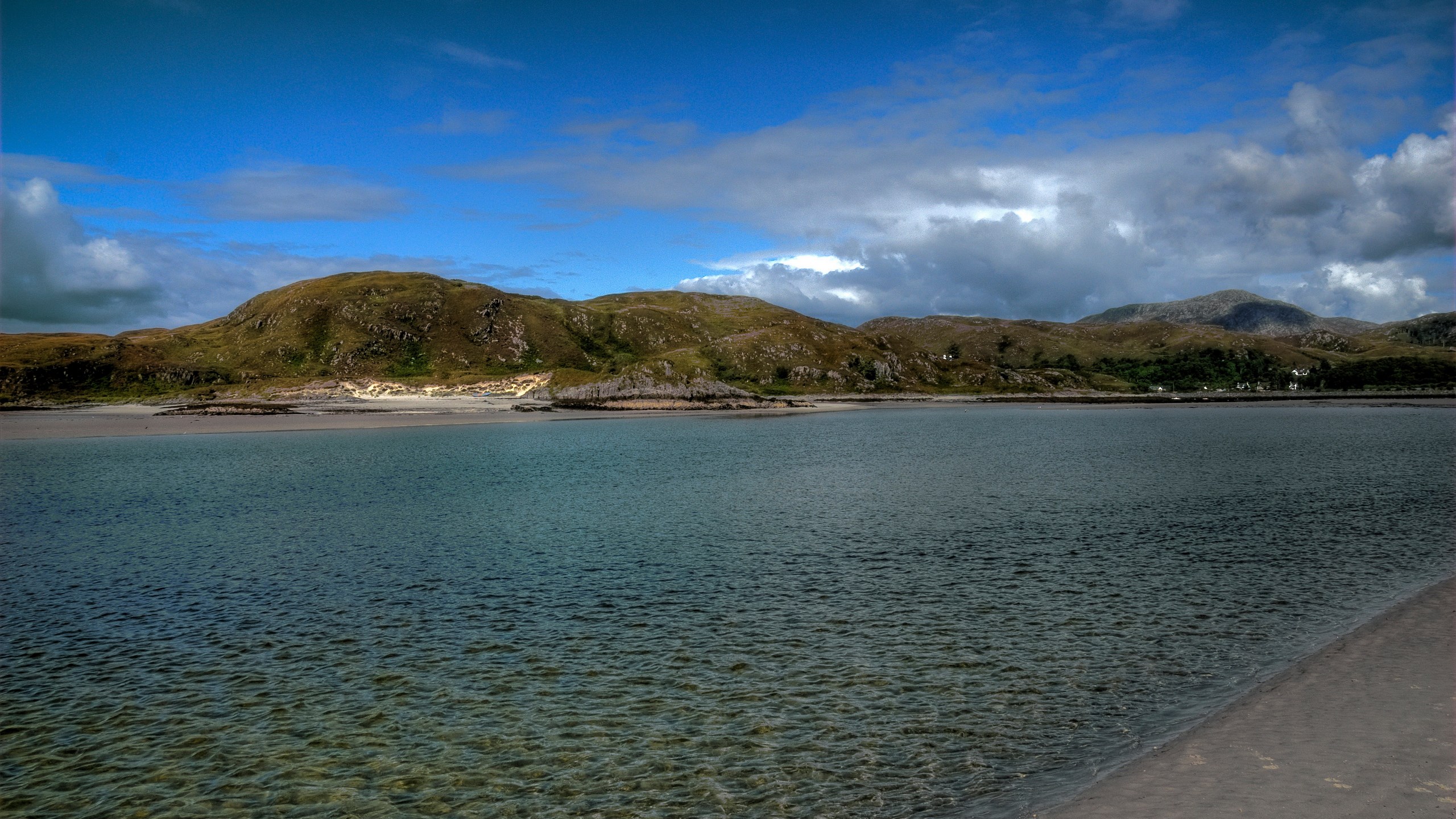 Coastal landscape with hills and water HD Wallpaper