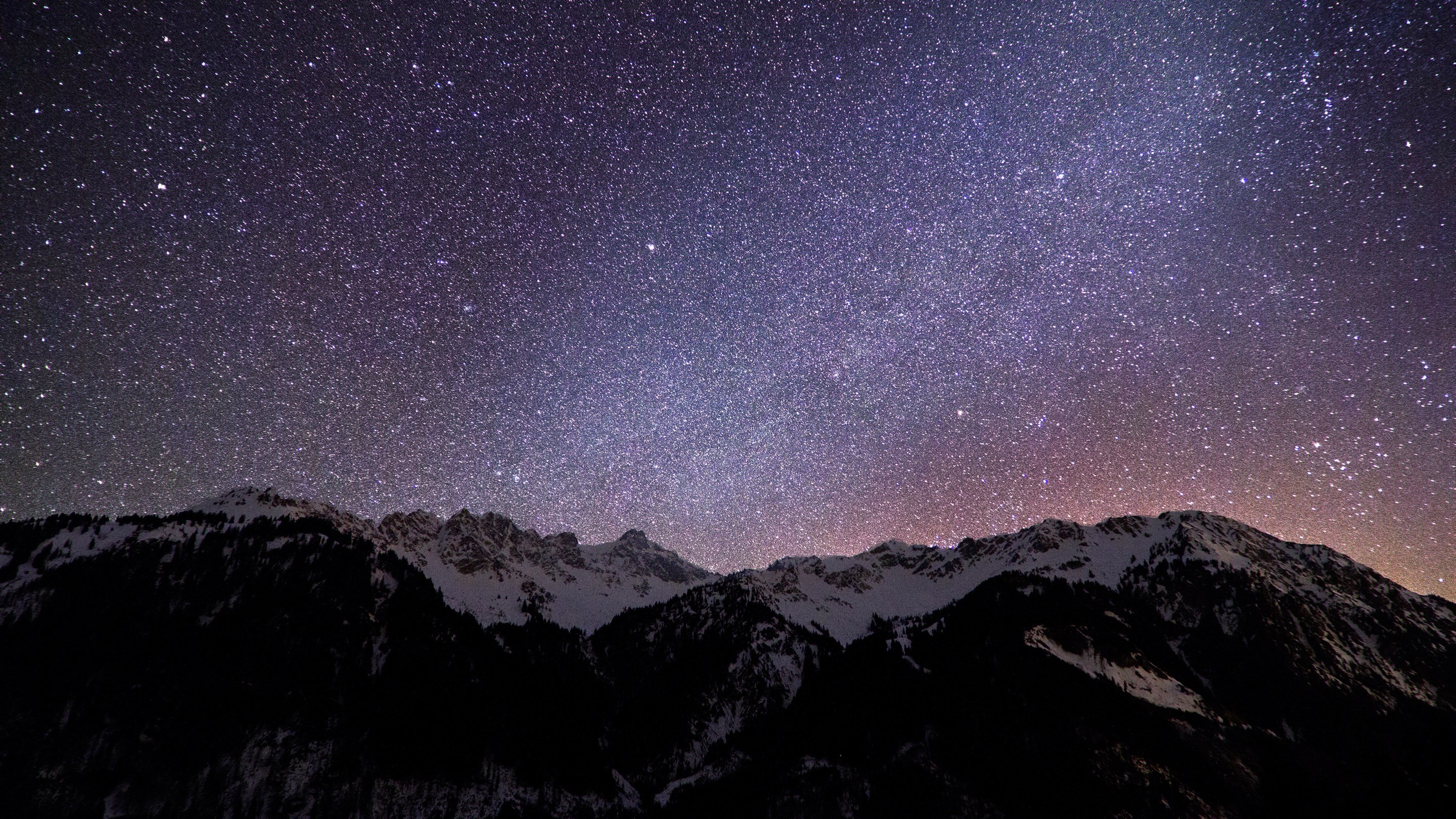 Starry night sky over snow-capped mountains HD Wallpaper