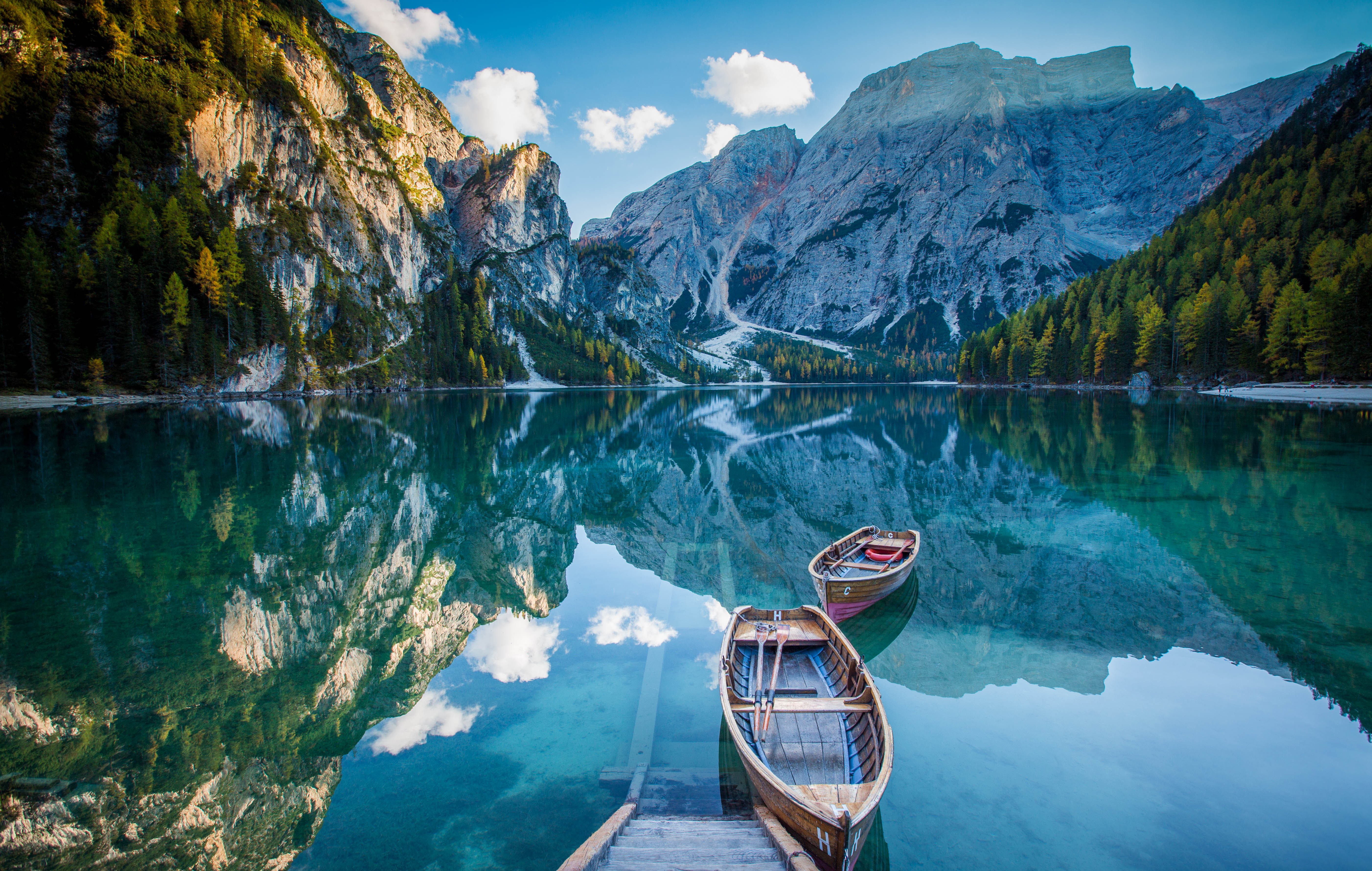 Boats on a mountain lake with reflections HD Wallpaper