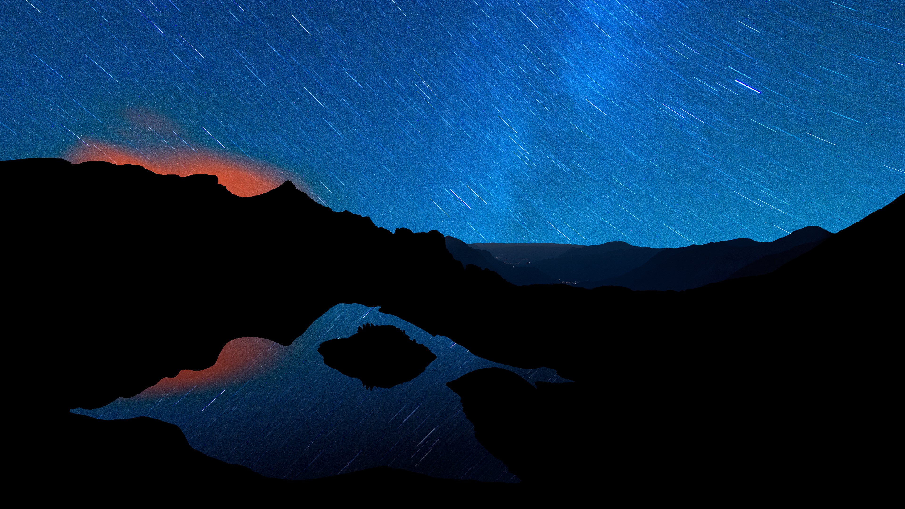 Star trails over mountains and a lake HD Wallpaper