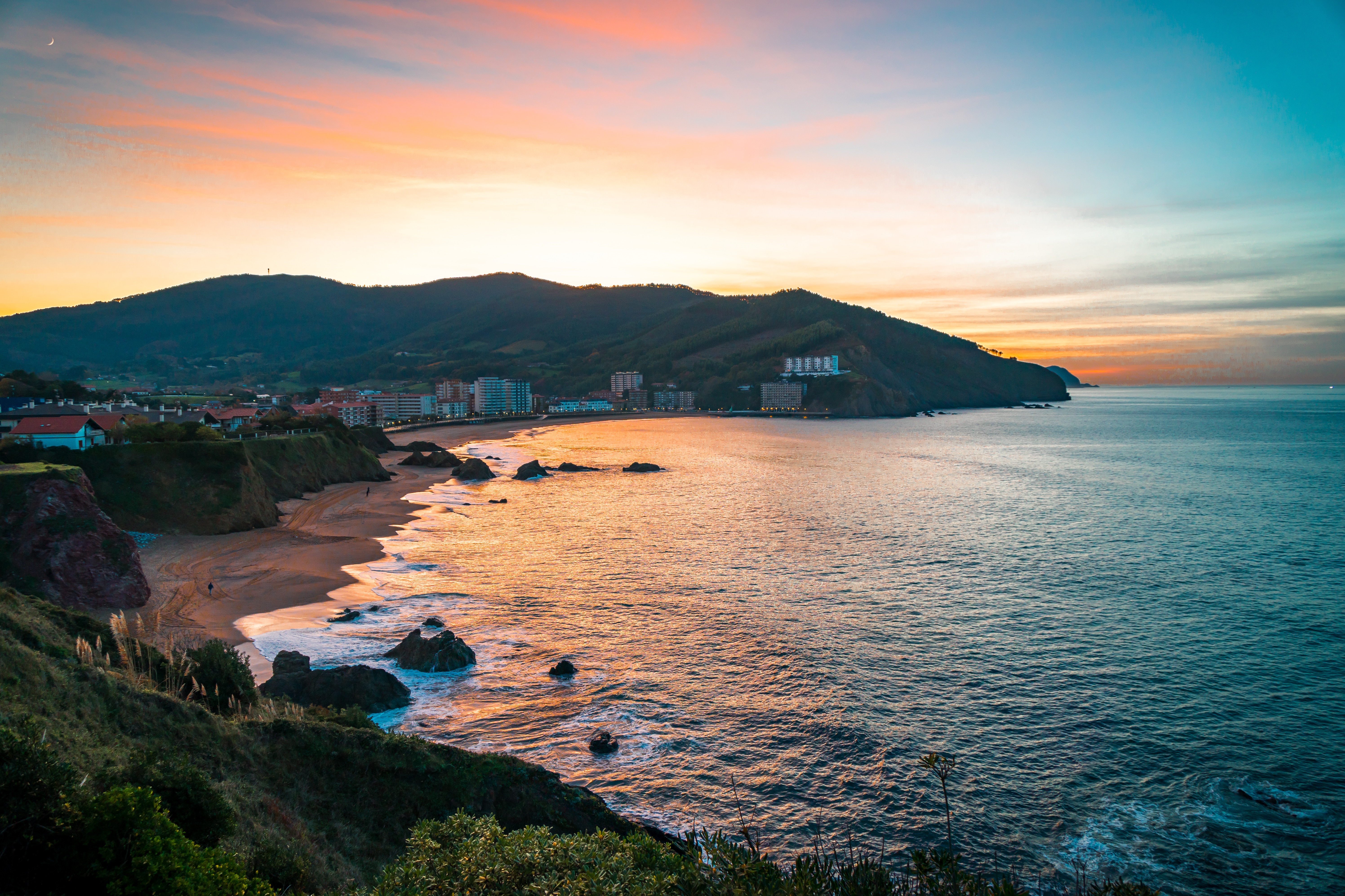 Sunset over Bakio beach and coastline, Spain HD Wallpaper