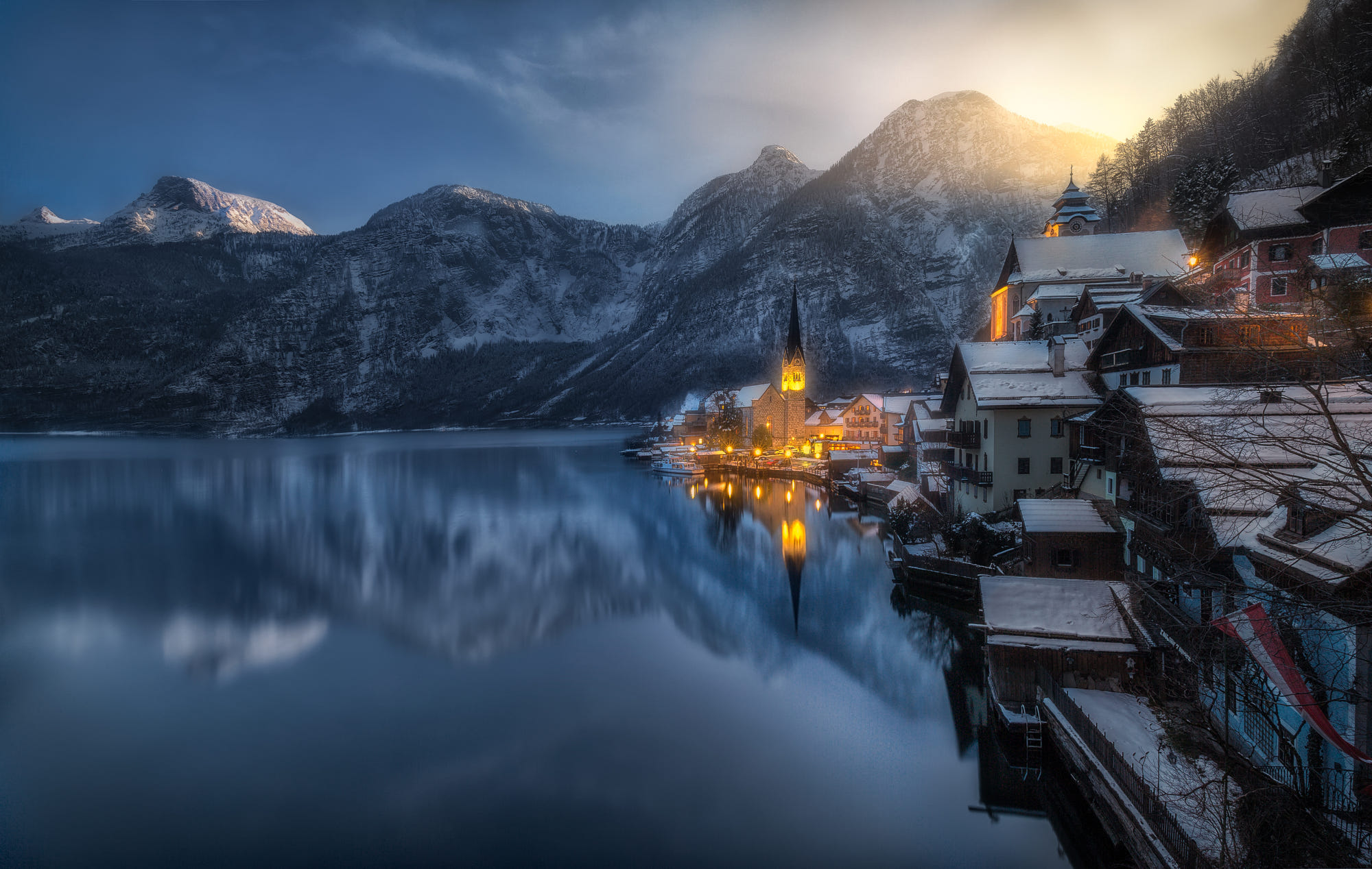 Winter cityscape reflection in Hallstatt mountains HD Wallpaper