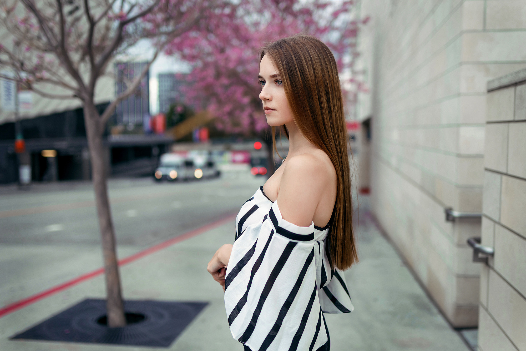 Woman with long brown hair in a striped off-the-shoulder top HD Wallpaper